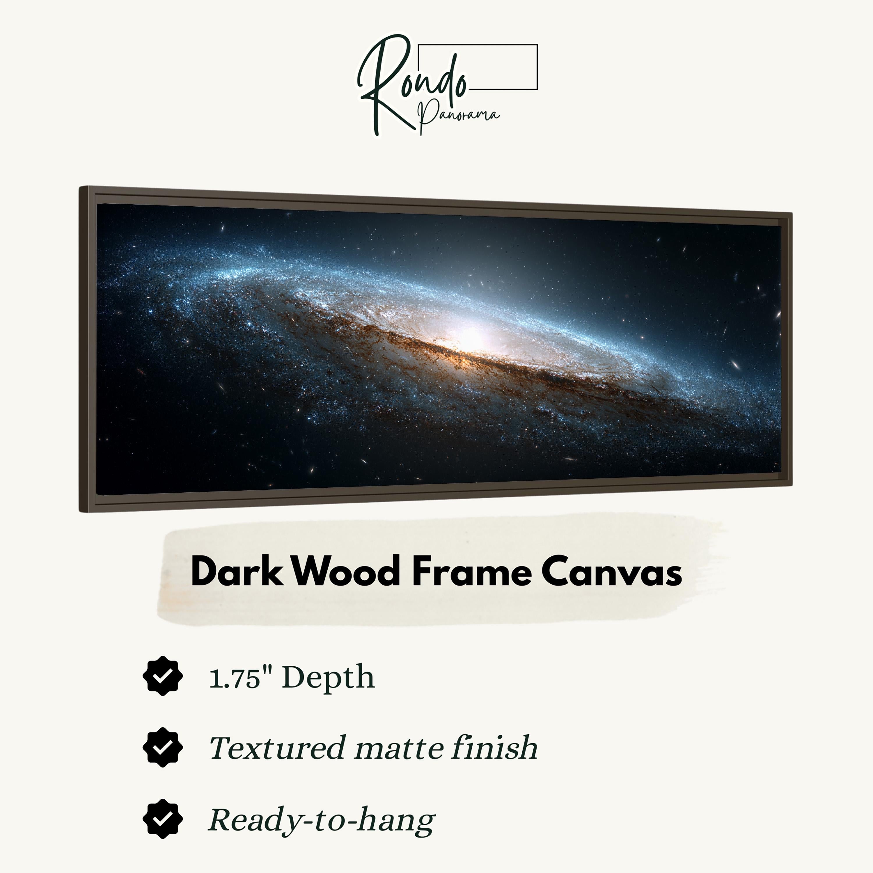The image is a dark wood frame canvas depicting a galaxy with a bright center and dark background.