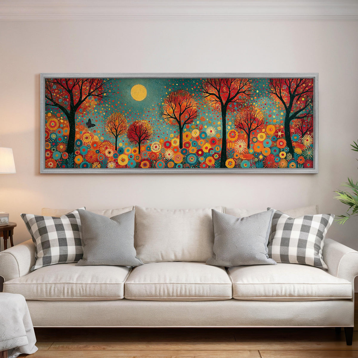 Folk art autumn forest with flowers panoramic canvas print above a white sofa in a bright living room