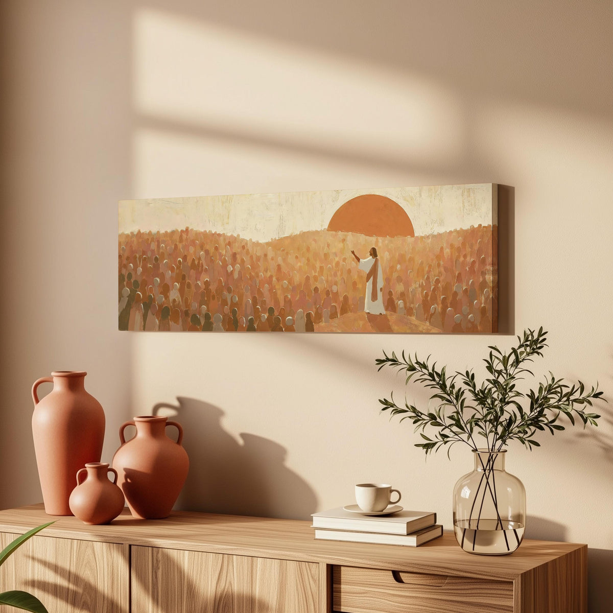 Jesus preaching to a crowd at sunset long horizontal canvas print above a wooden sideboard
