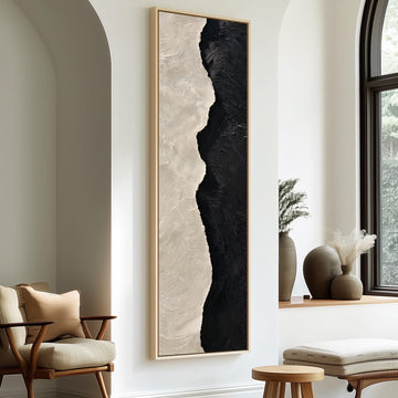 Black and cream textured brushstroke long vertical canvas print in a sunlit living space
