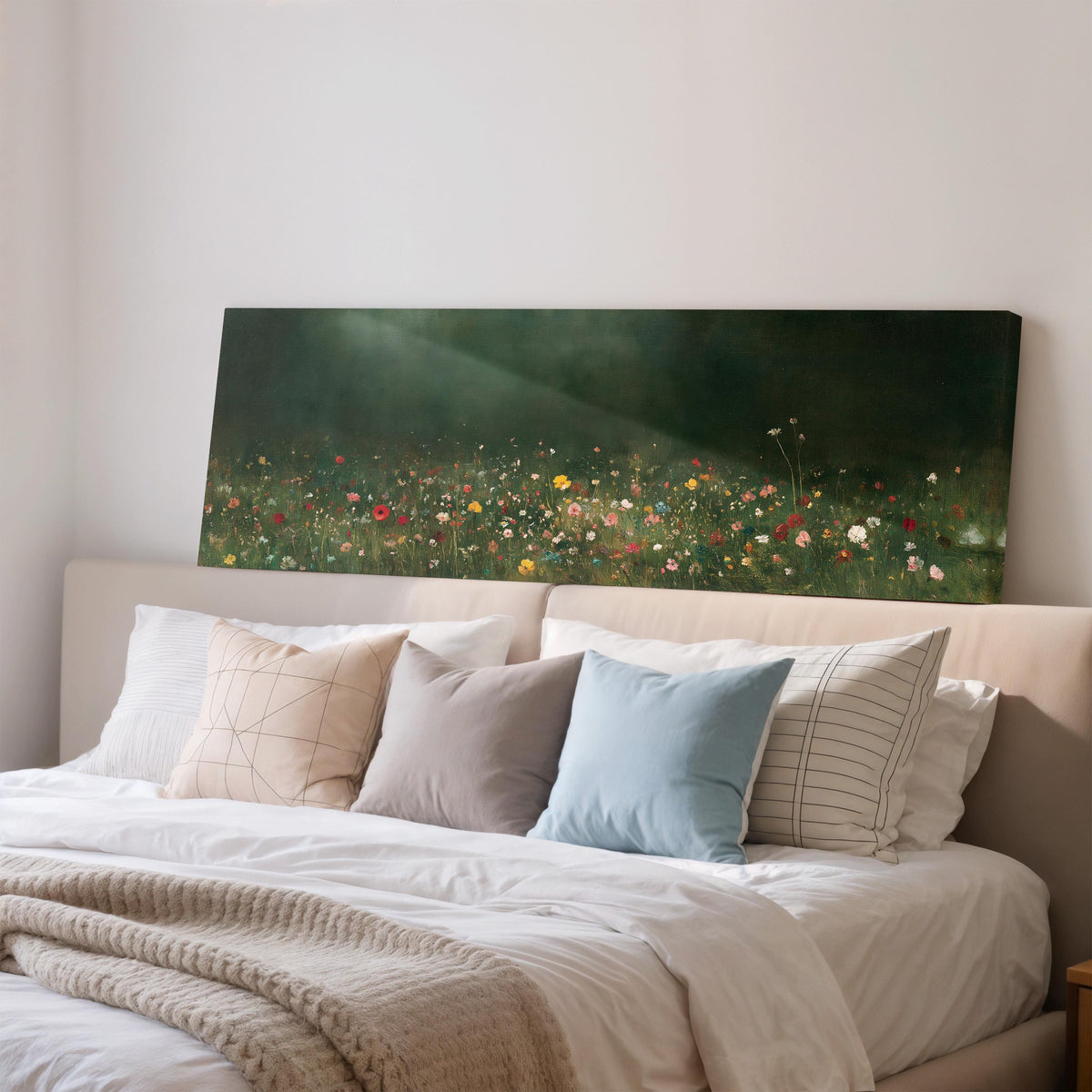 Wildflower meadow at the edge of a dark forest wide panoramic canvas print above a bed in a bedroom