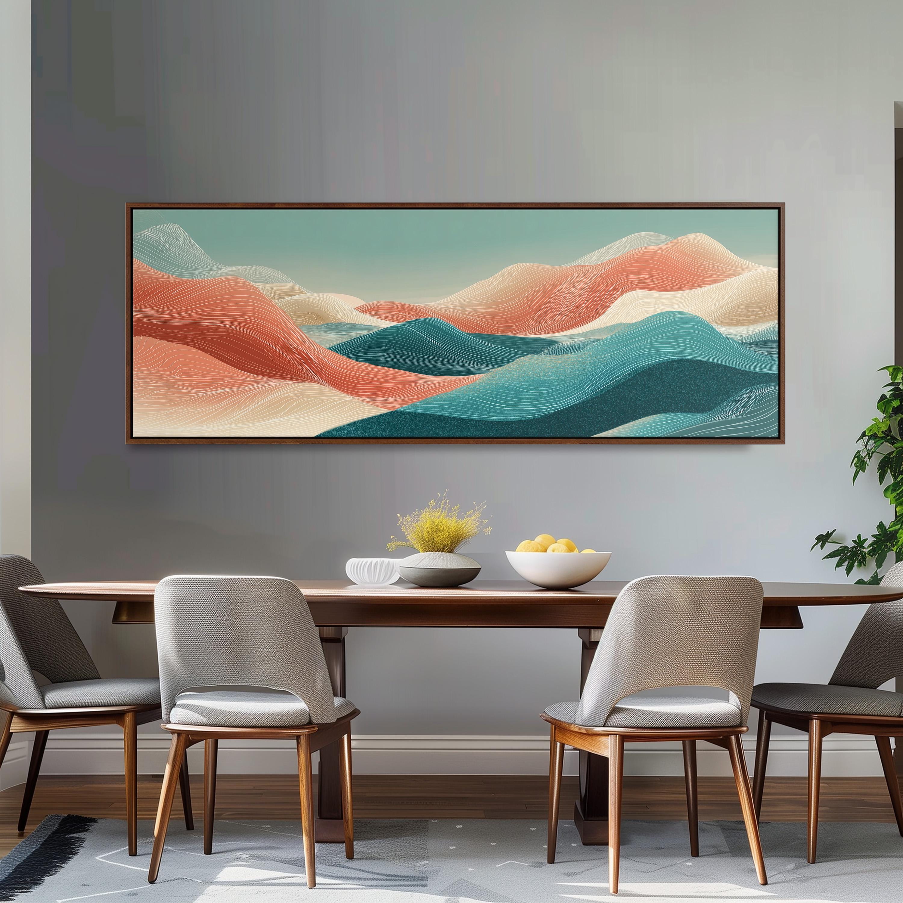 a large, colorful painting of mountains hanging on a wall above a wooden dining table with four chairs. The table is set with a bowl of fruit and a vase of flowers, creating a cozy and inviting atmosphere.