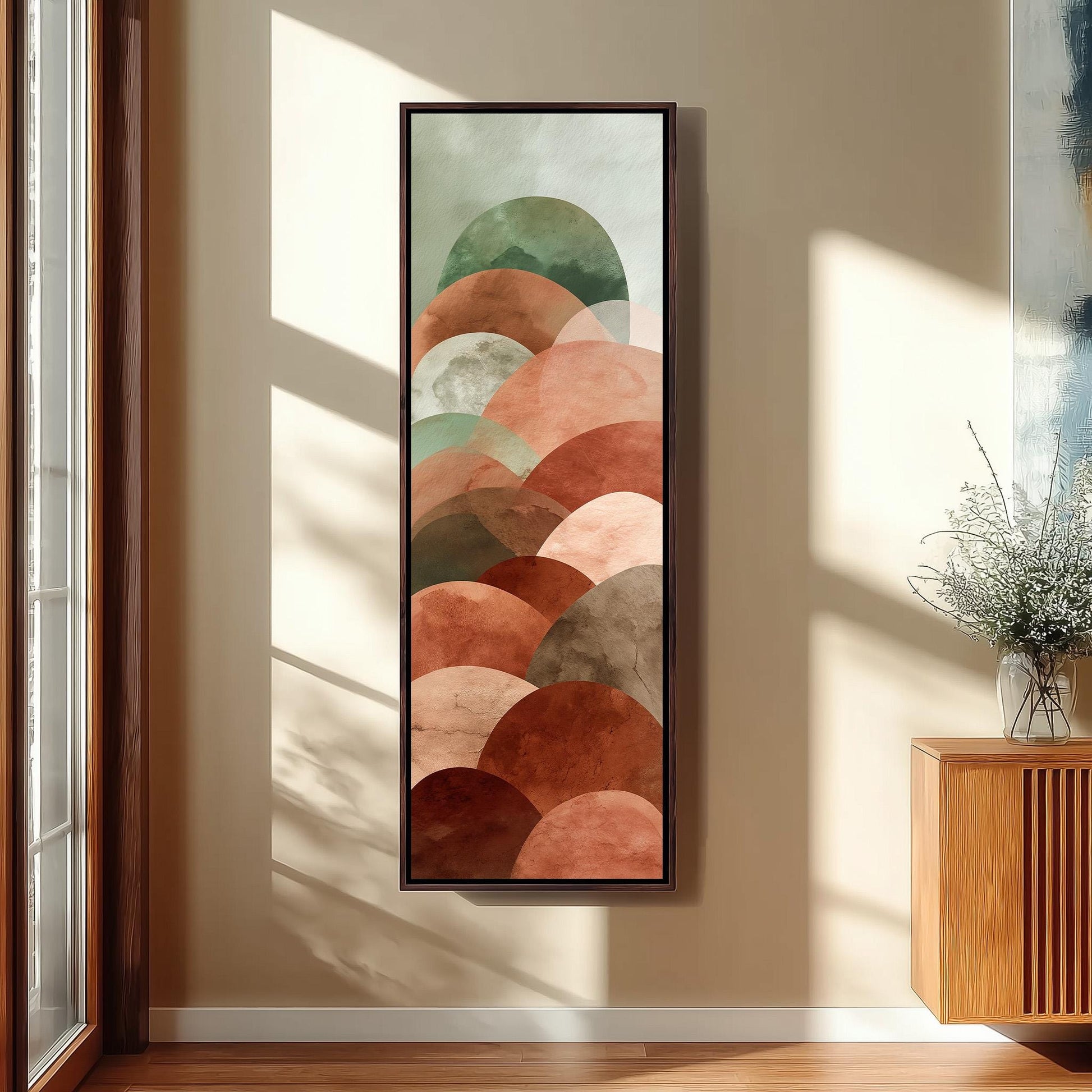 a large abstract painting hanging on a wall, depicting a series of overlapping circles in various shades of brown and orange.