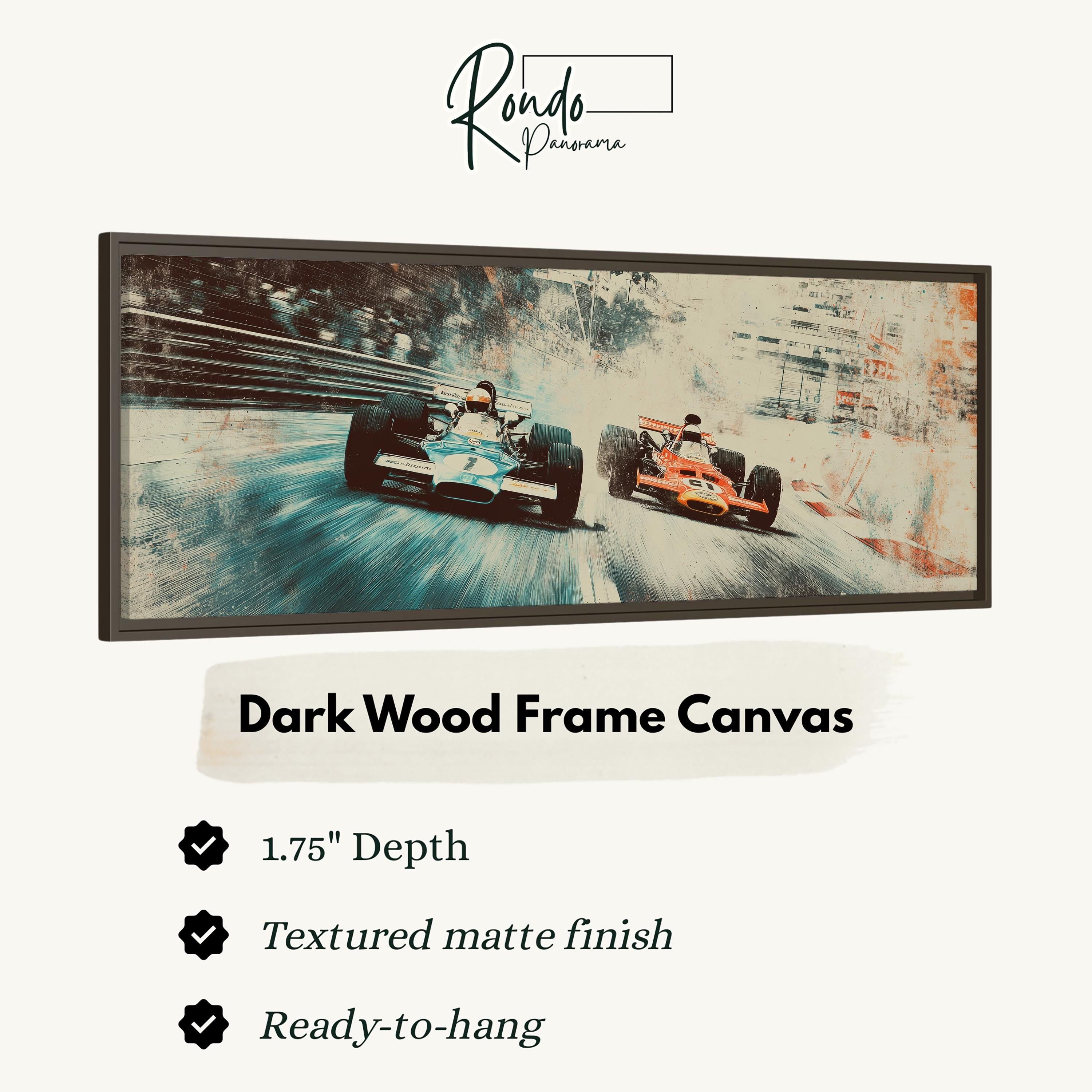 a framed artwork of two Formula One race cars speeding down a track.