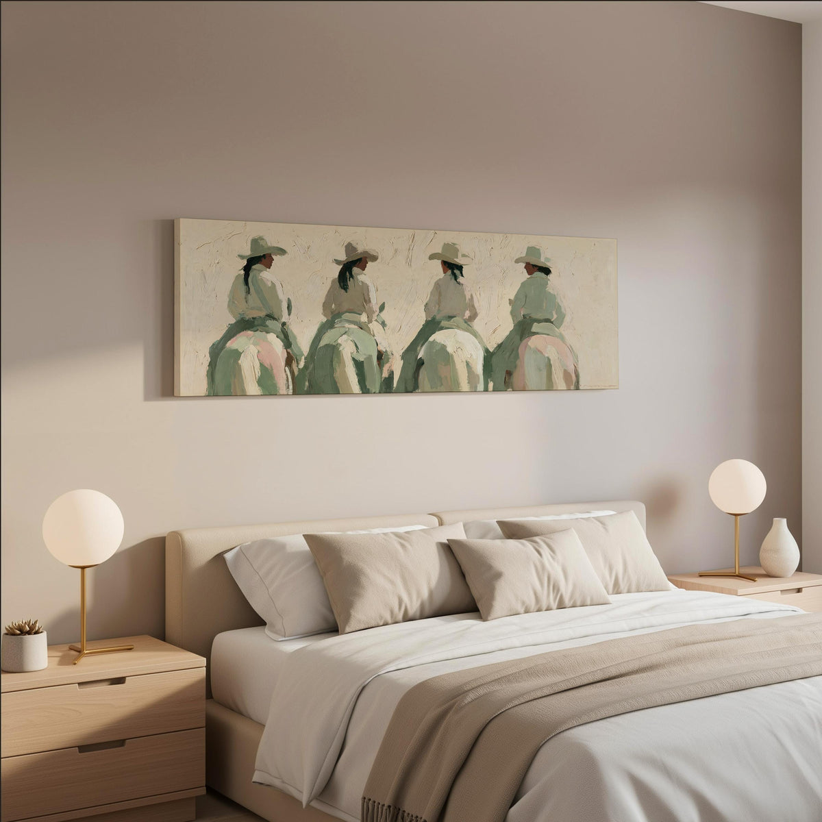Cowgirl trail riders wide panoramic canvas print above a bed in a neutral bedroom