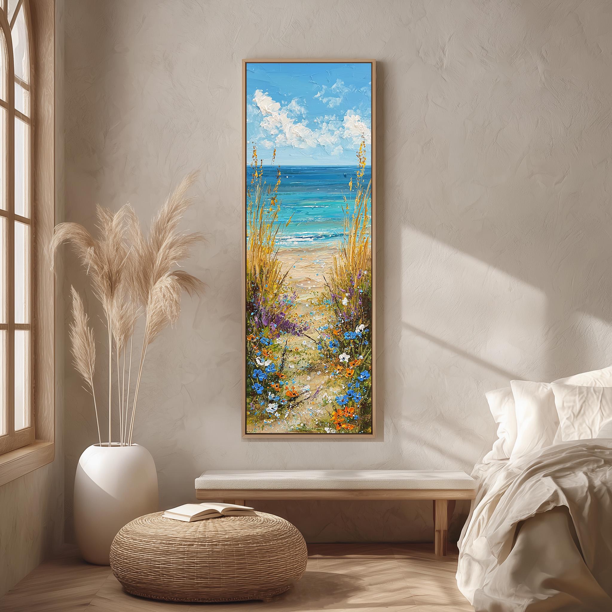 a serene bedroom scene with a large painting of a beach scene hanging on the wall. The painting depicts a sandy beach with a clear blue sky and fluffy white clouds. The room is decorated with a large window, a white bed, a wicker ottoman, and a potted plant.