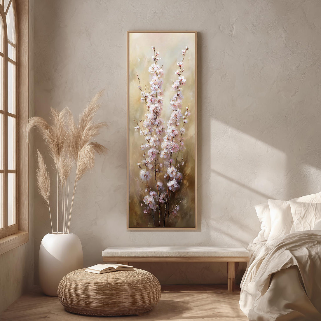 a serene and cozy bedroom scene, featuring a large floral painting hanging on the wall, a white bed with a white pillow, a white vase with tall potted plants, and a woven ottoman.