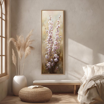 a serene and cozy bedroom scene, featuring a large floral painting hanging on the wall, a white bed with a white pillow, a white vase with tall potted plants, and a woven ottoman.
