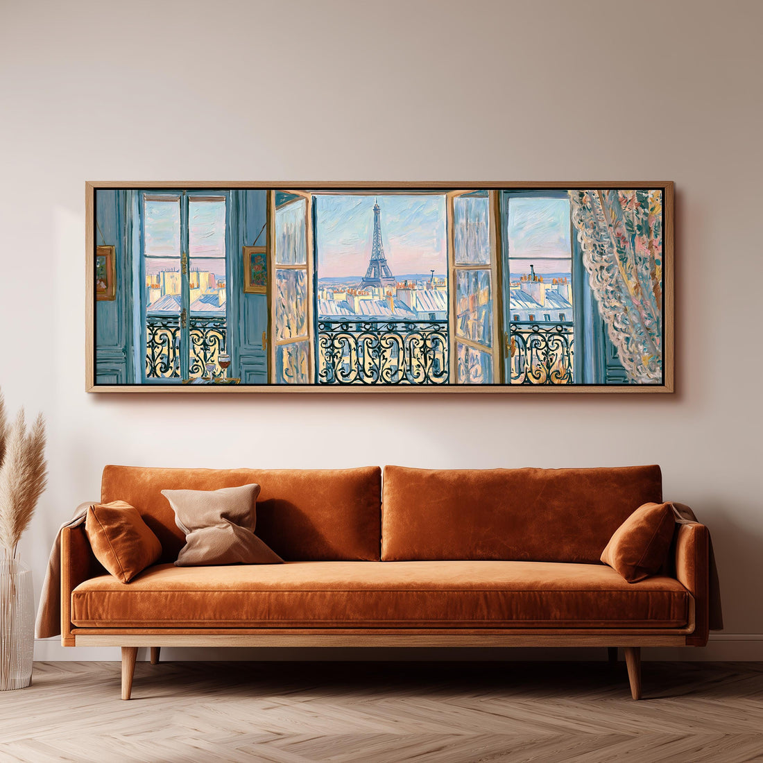 Eiffel Tower seen through a blue Paris window long horizontal canvas print above a sofa in a living room