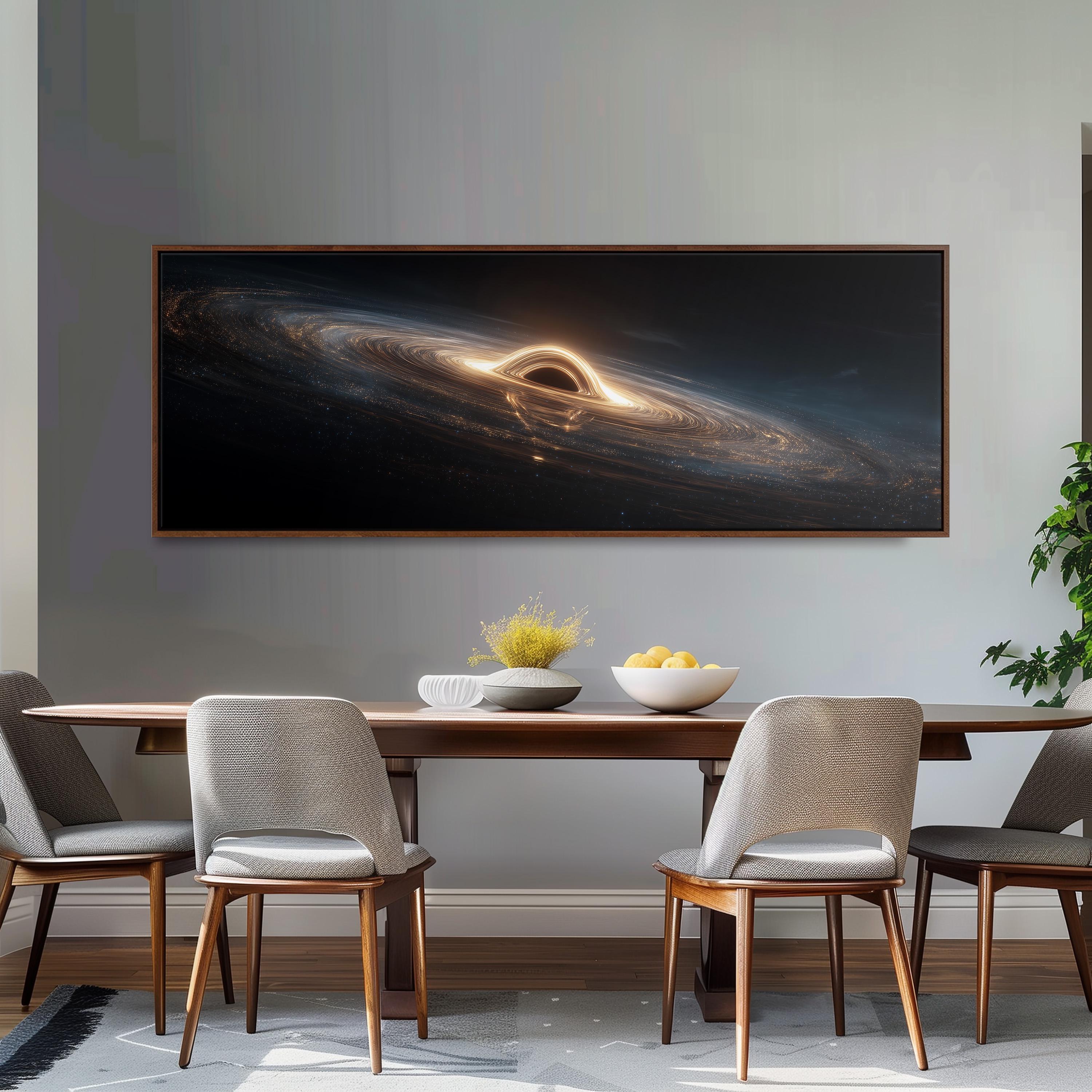 a dining room with a large, framed artwork depicting a black hole above a wooden table with four chairs. The artwork is hanging on a gray wall above the table.