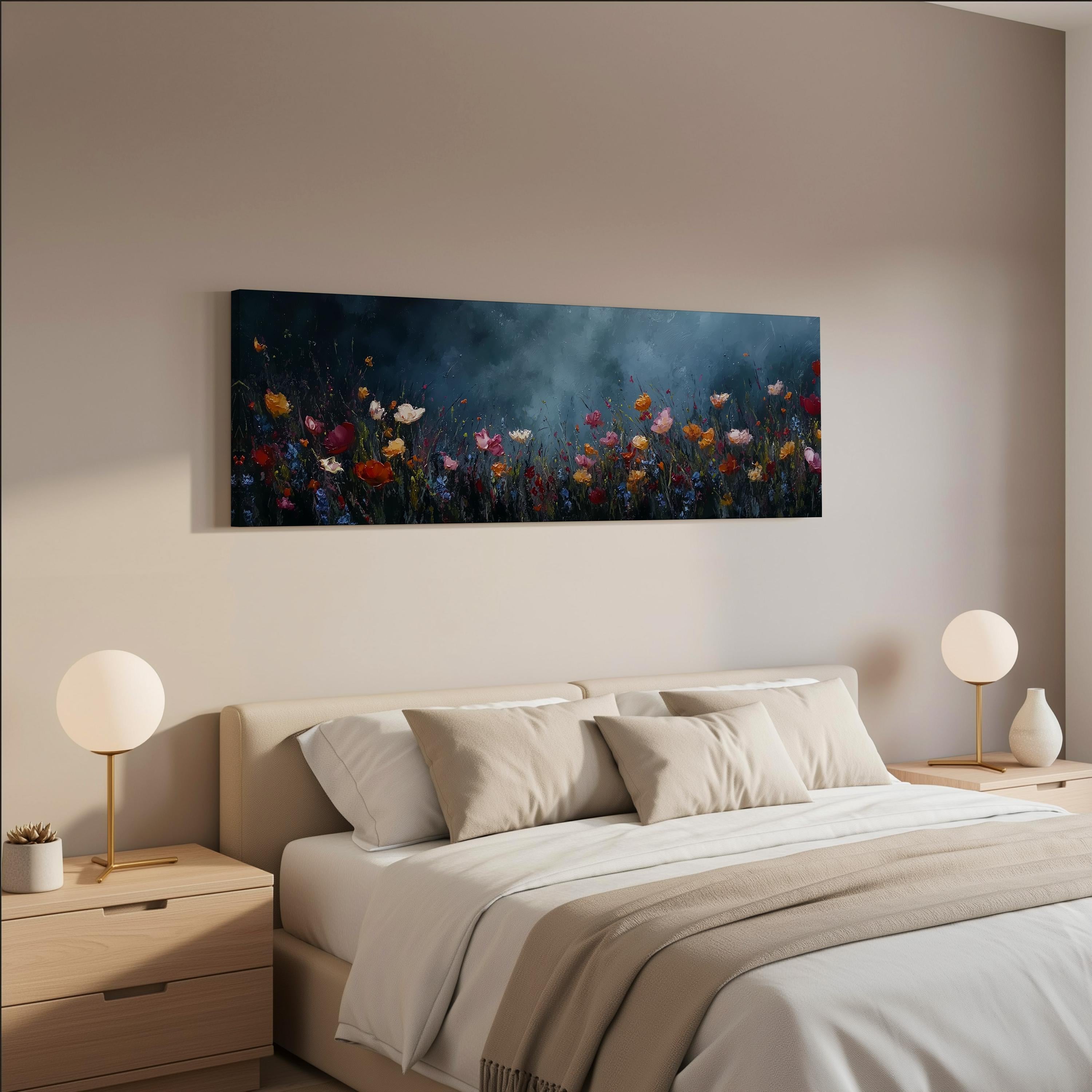 a serene bedroom scene with a large bed adorned with white linens and beige pillows, flanked by two white lamps on nightstands. Above the bed hangs a large painting of a field of colorful flowers, creating a harmonious and tranquil atmosphere in the room.