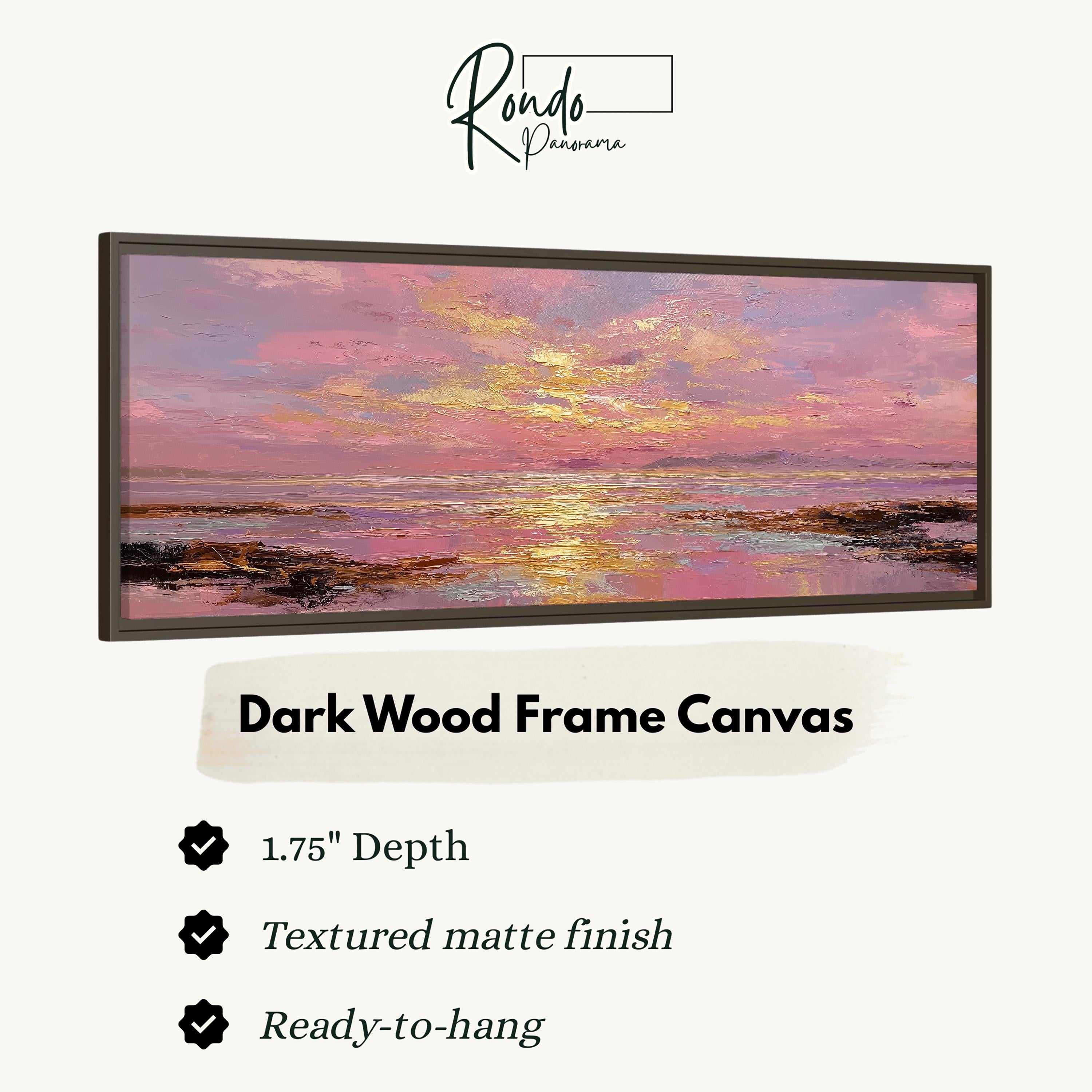The image is a framed artwork depicting a sunset over a body of water, with a dark wood frame.