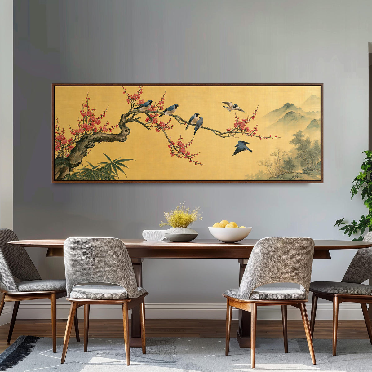 Birds on a plum blossom branch on gold long horizontal canvas print above a dining table