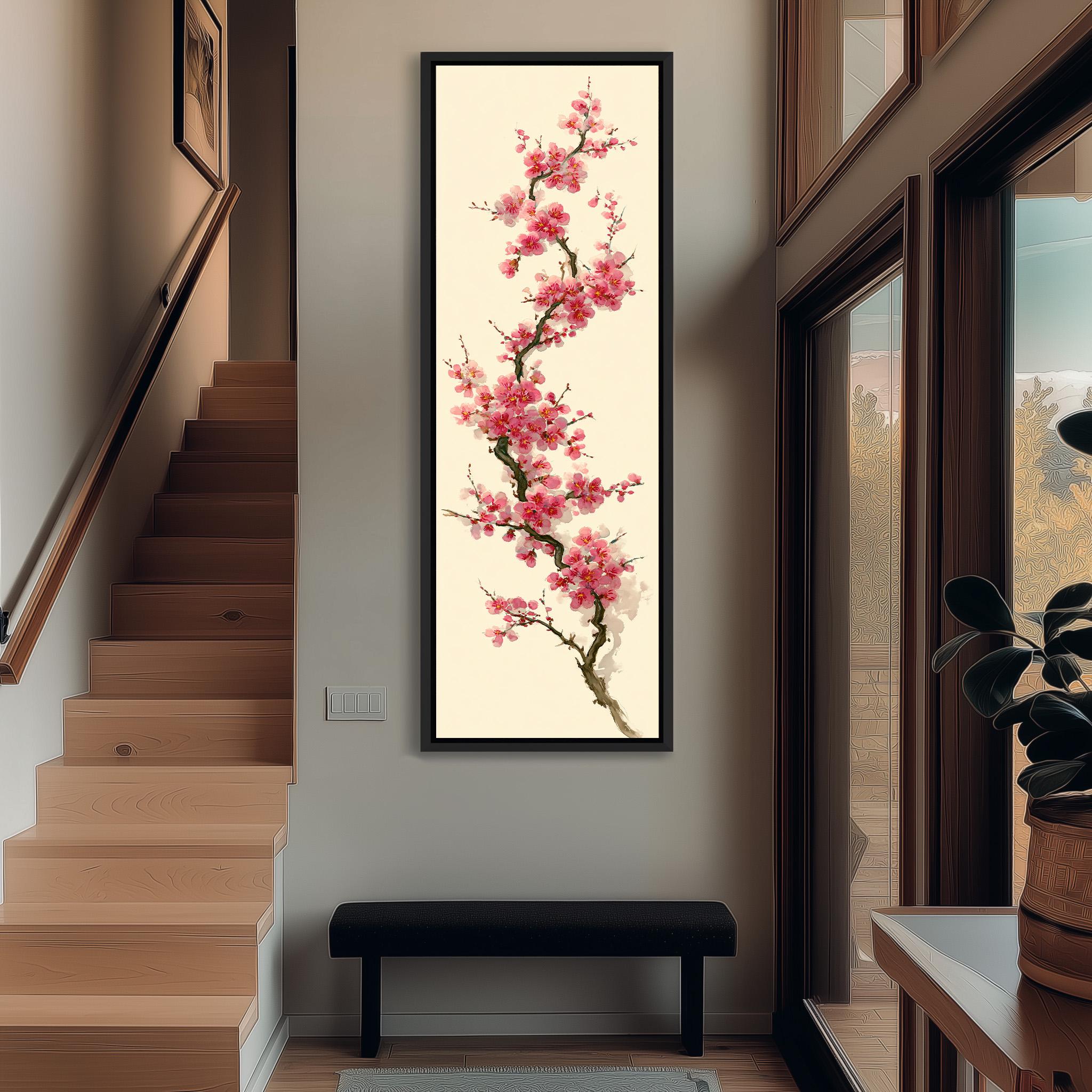 a large, framed painting of a cherry blossom tree hanging on the wall of a hallway. The painting is the focal point of the room, with a wooden staircase visible in the background.