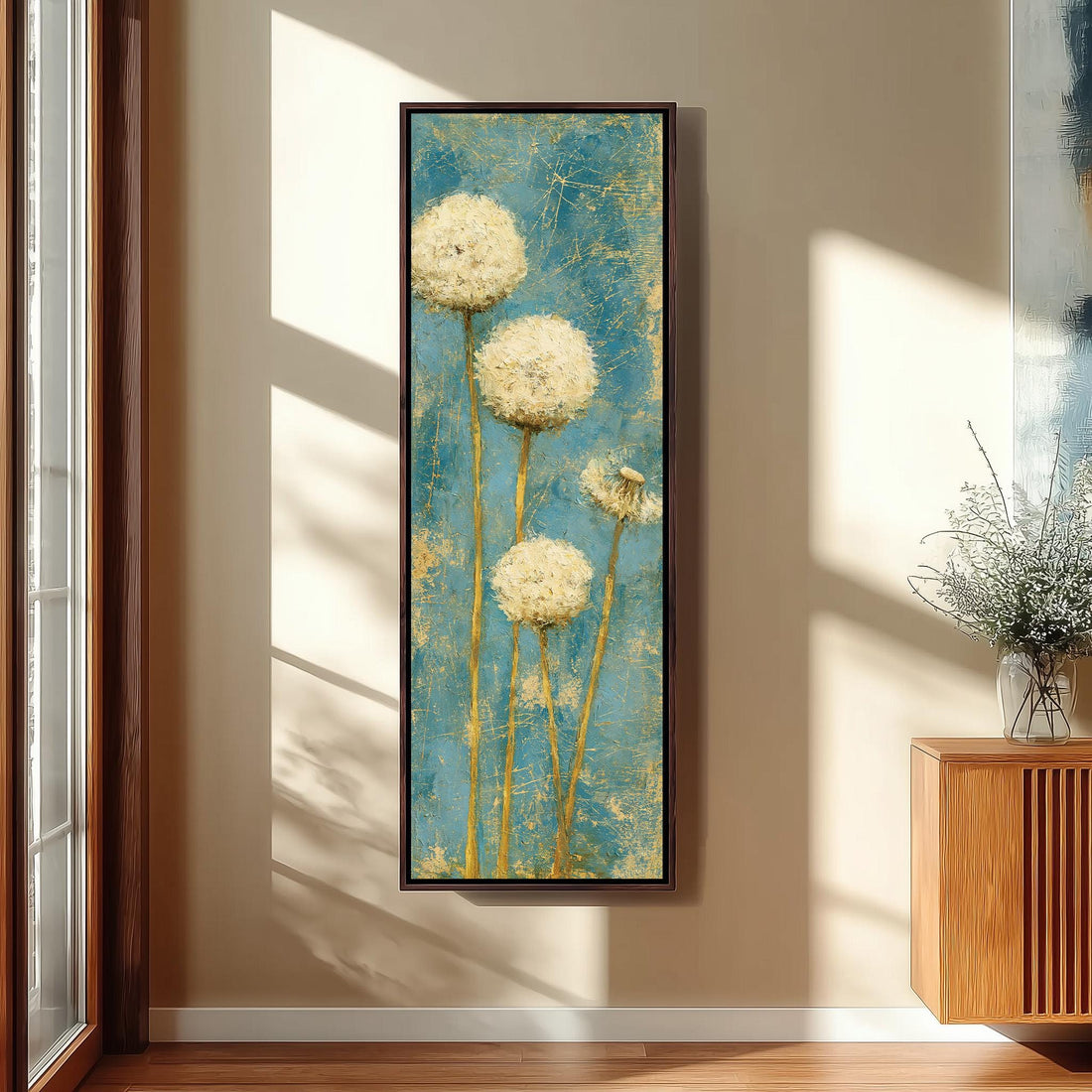 Dandelion clocks on teal long vertical canvas print in a sunlit living space
