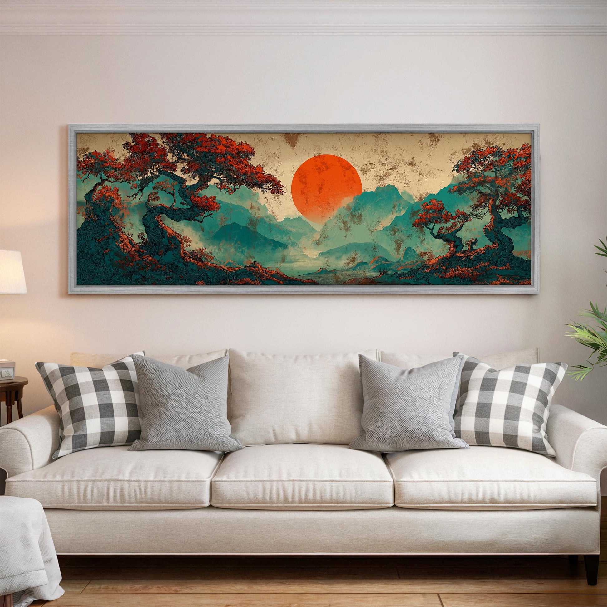 a large, colorful painting of a landscape with a prominent sun in the sky, surrounded by trees and mountains. The painting is displayed on a wall above a white couch, creating a visually striking and artistic focal point in the room.