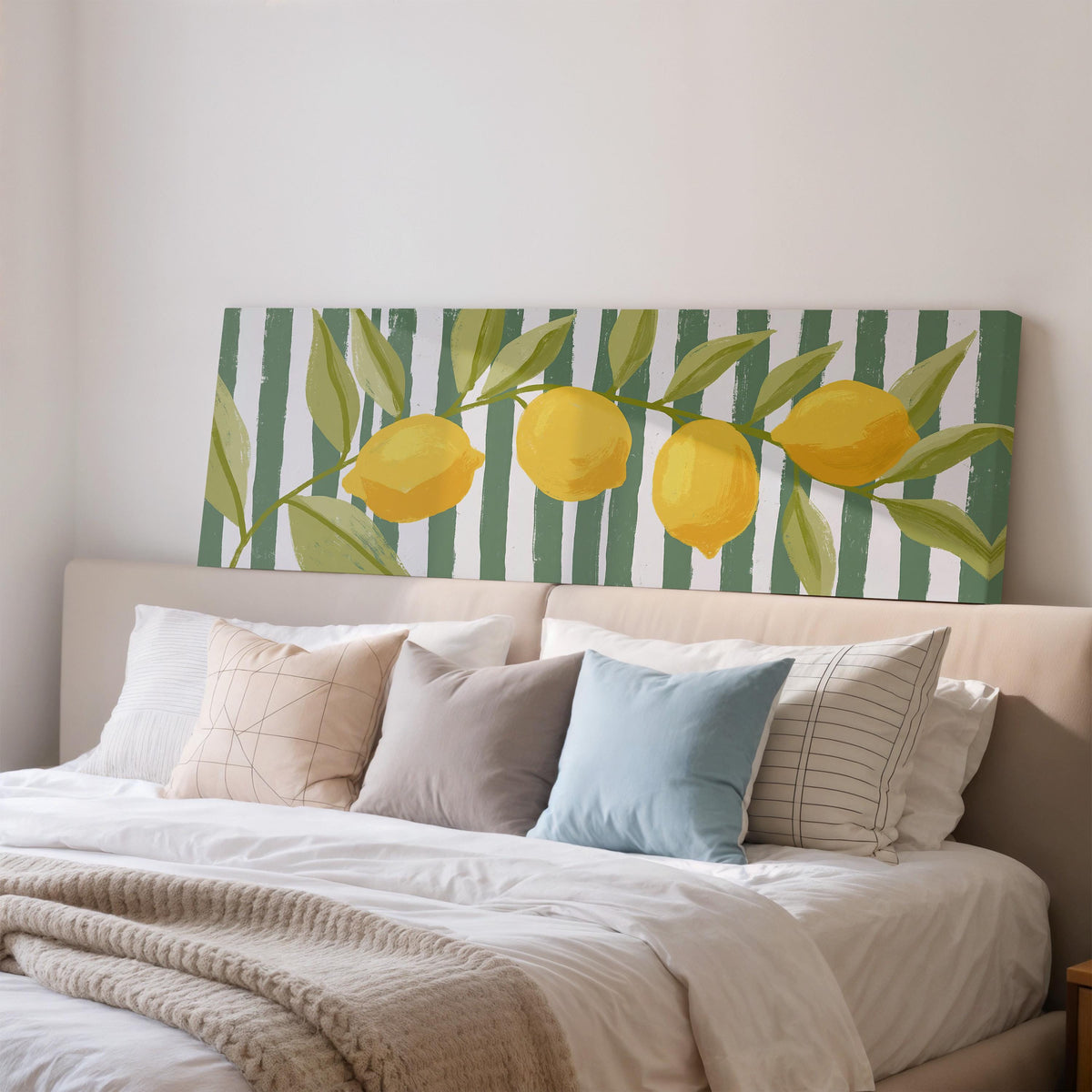 Lemon branch on green stripes wide panoramic canvas print above a bed in a bedroom