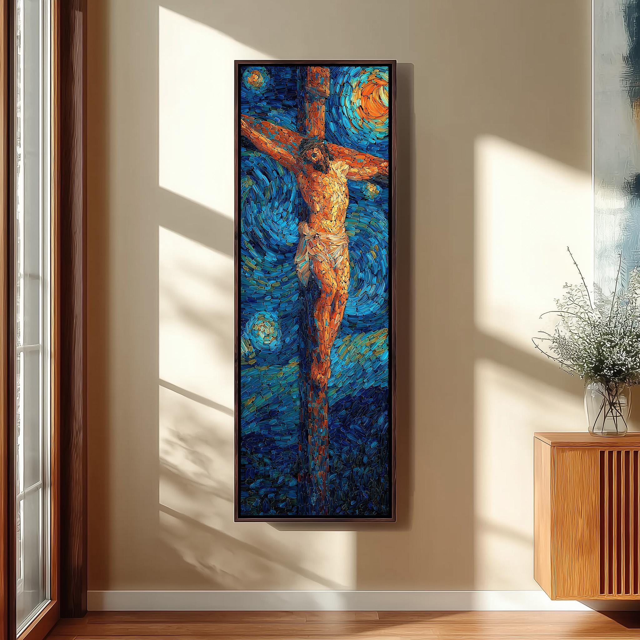 a large, colorful painting of a figure on a cross, hanging on a wall in a room with a wooden cabinet and a vase of flowers.
