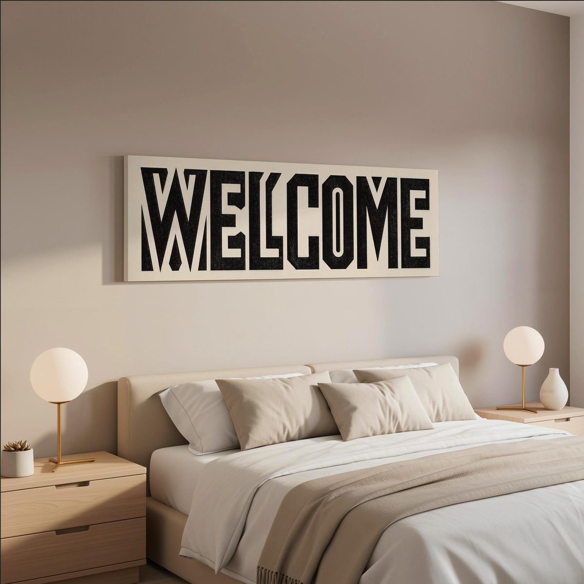 Bold welcome block letters wide panoramic canvas print above a bed in a neutral bedroom