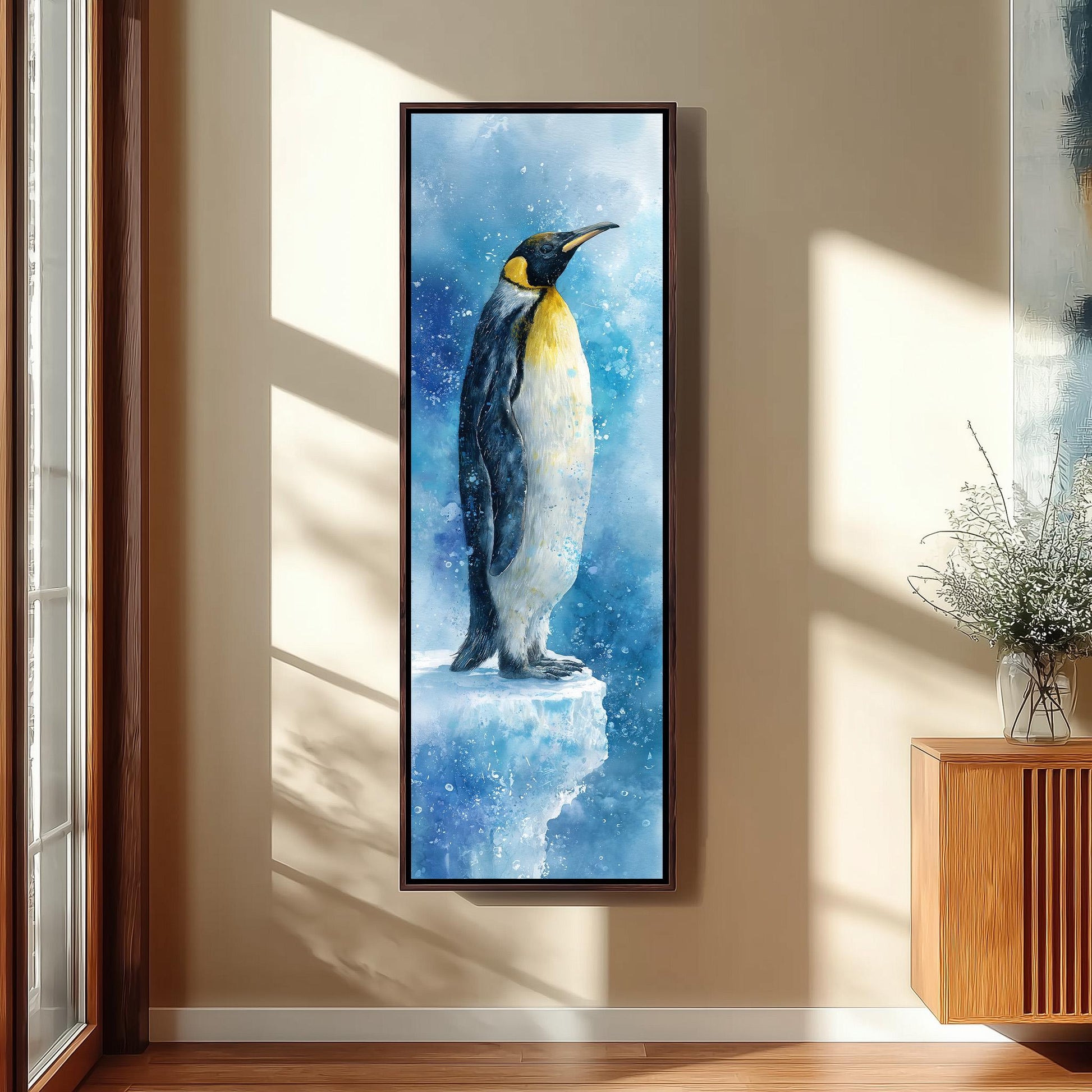 a large, framed painting of a penguin standing on a snowy surface, with a blue and white background.