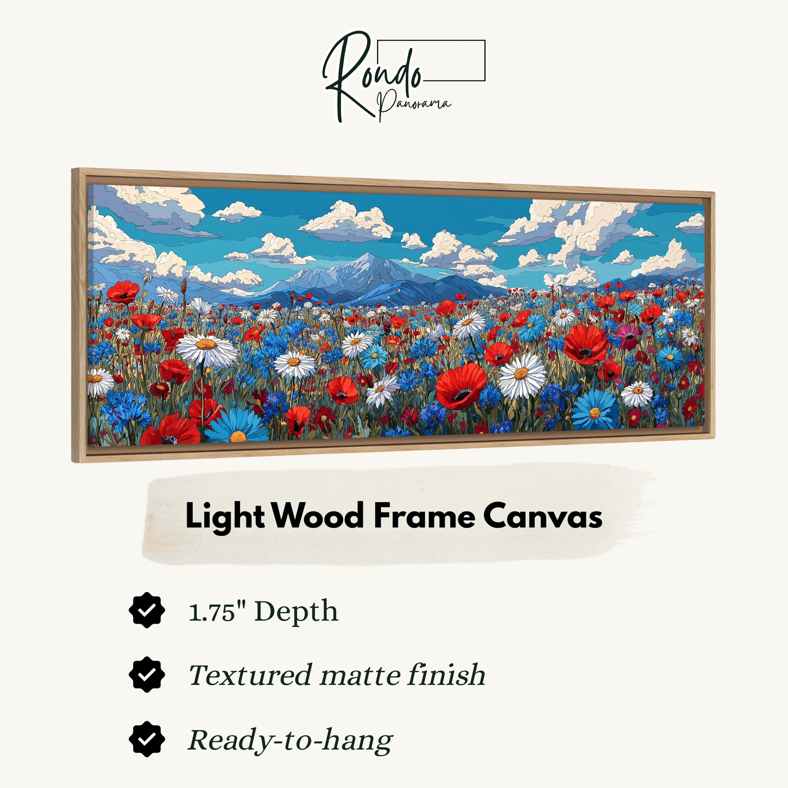 The image is a light wood frame canvas depicting a vibrant field of flowers, including red poppies and blue and white daisies, set against a backdrop of mountains and a blue sky with clouds.