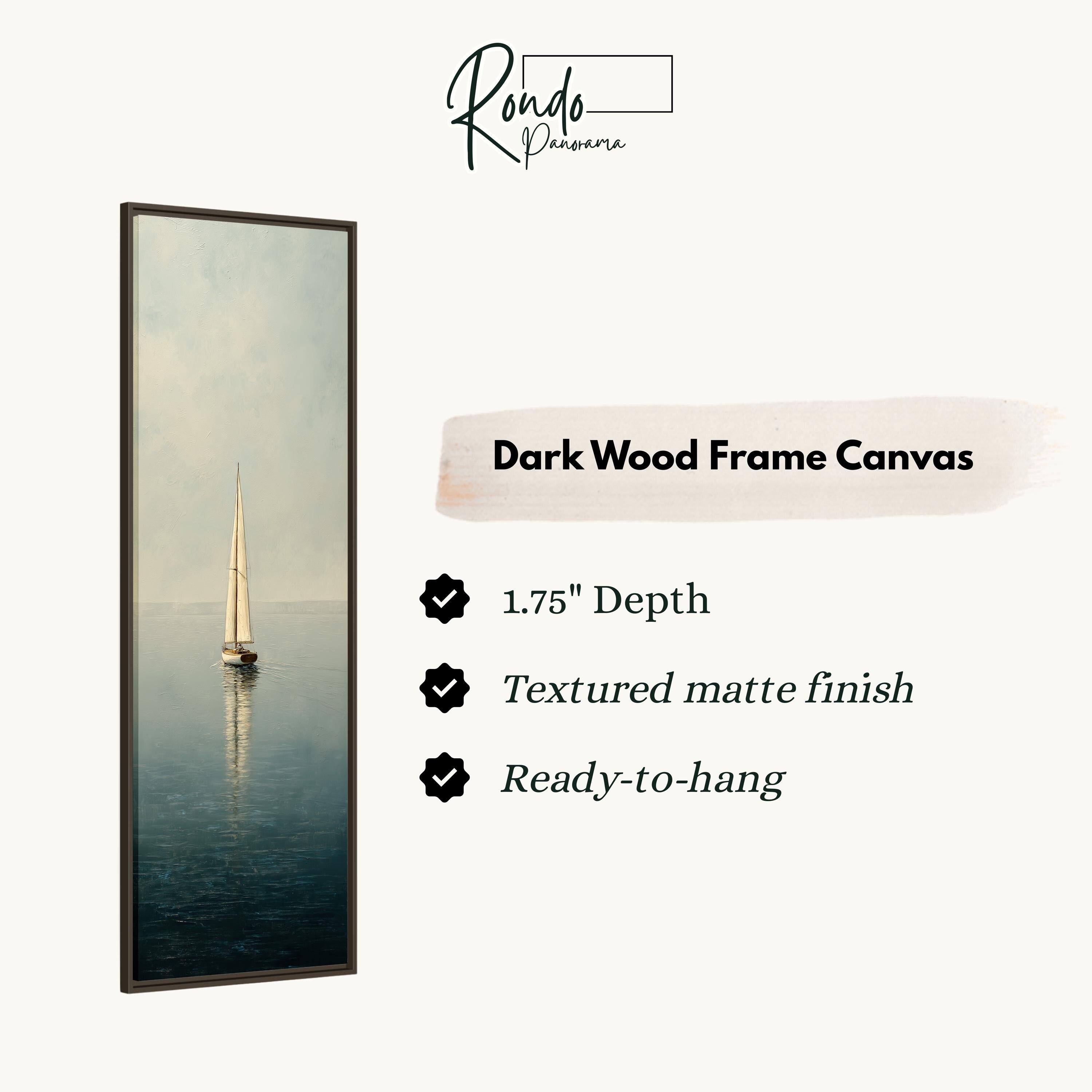 a dark wood frame canvas depicting a sailboat on the water.