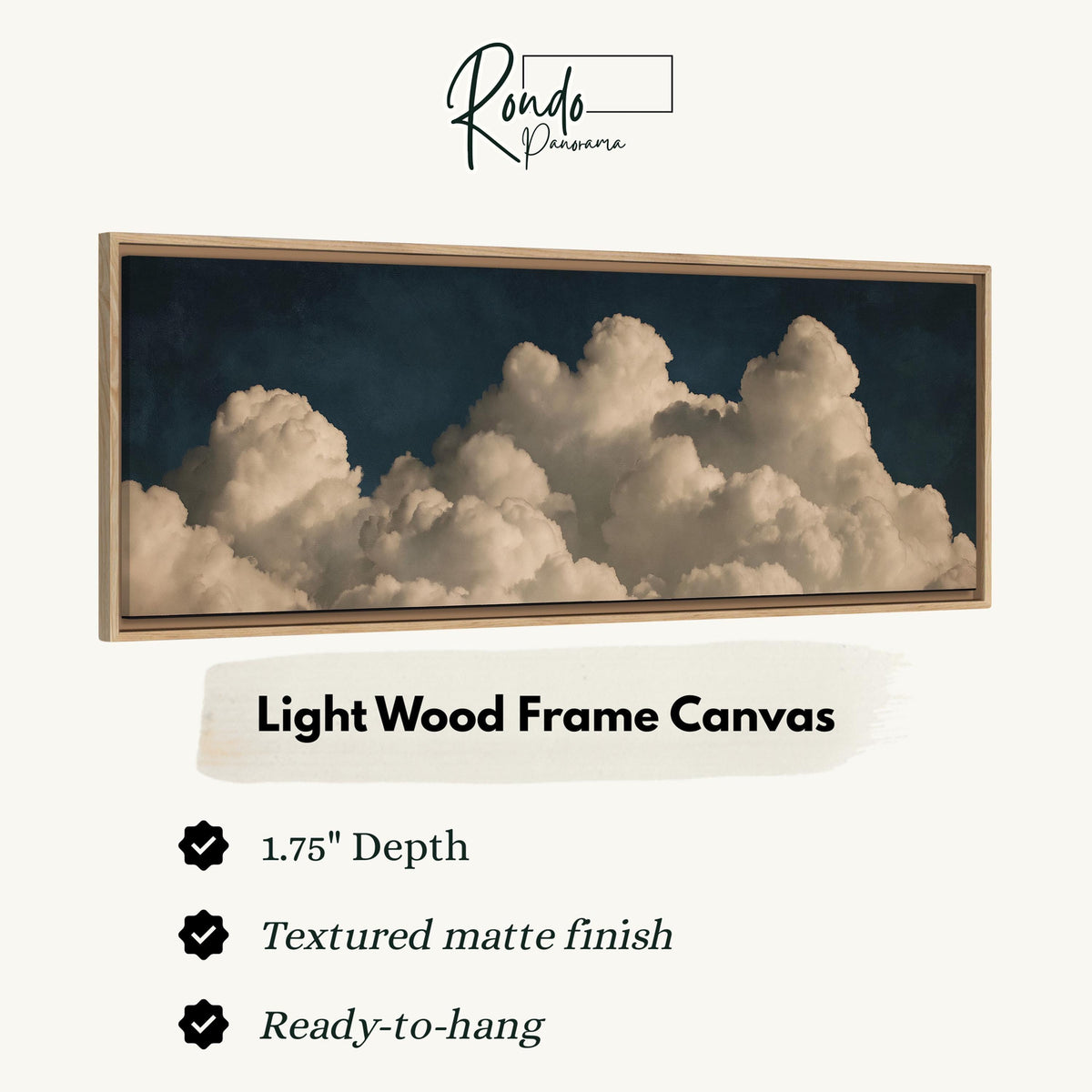 Cumulus clouds against a dark night sky canvas print in a light wood floating frame