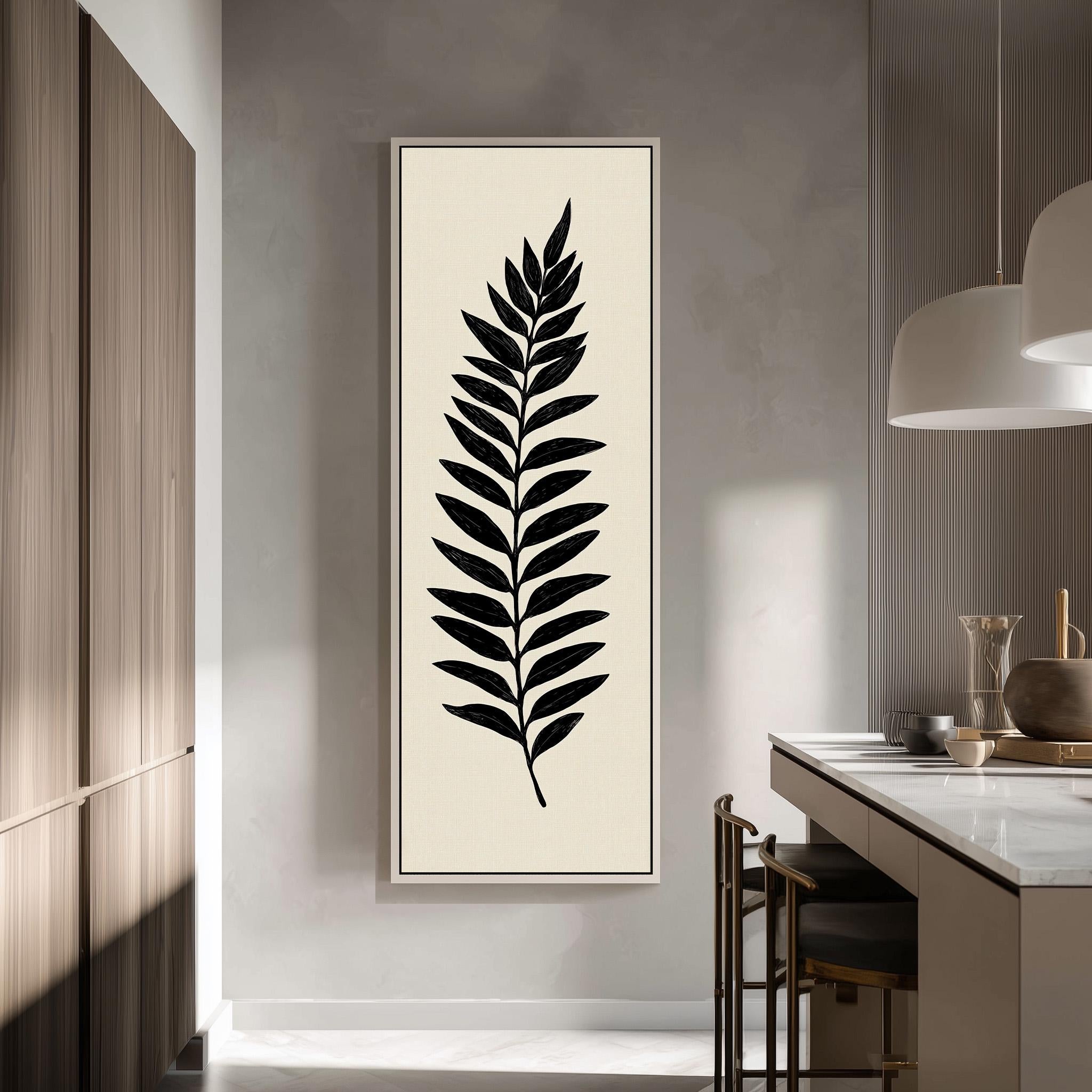 a minimalist kitchen interior with a large framed black and white leaf design on the wall.