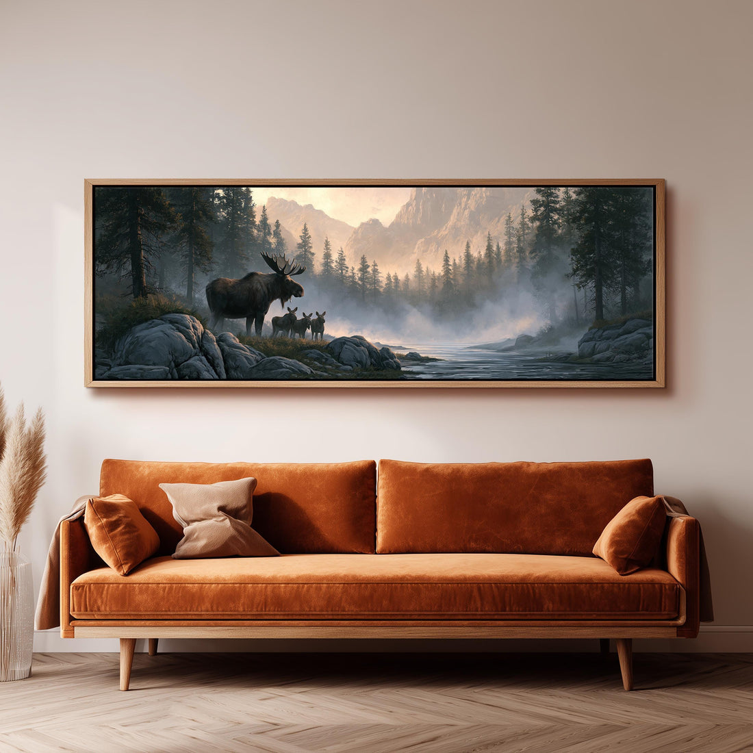 Moose and calf in a misty mountain valley long horizontal canvas print above a sofa in a living room