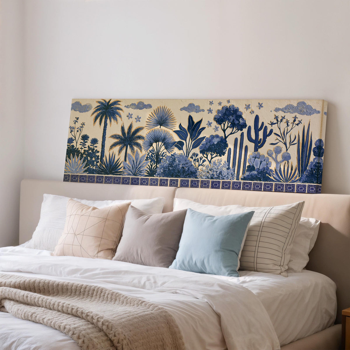 Blue palms, cacti and flowers pattern wide panoramic canvas print above a bed in a bedroom