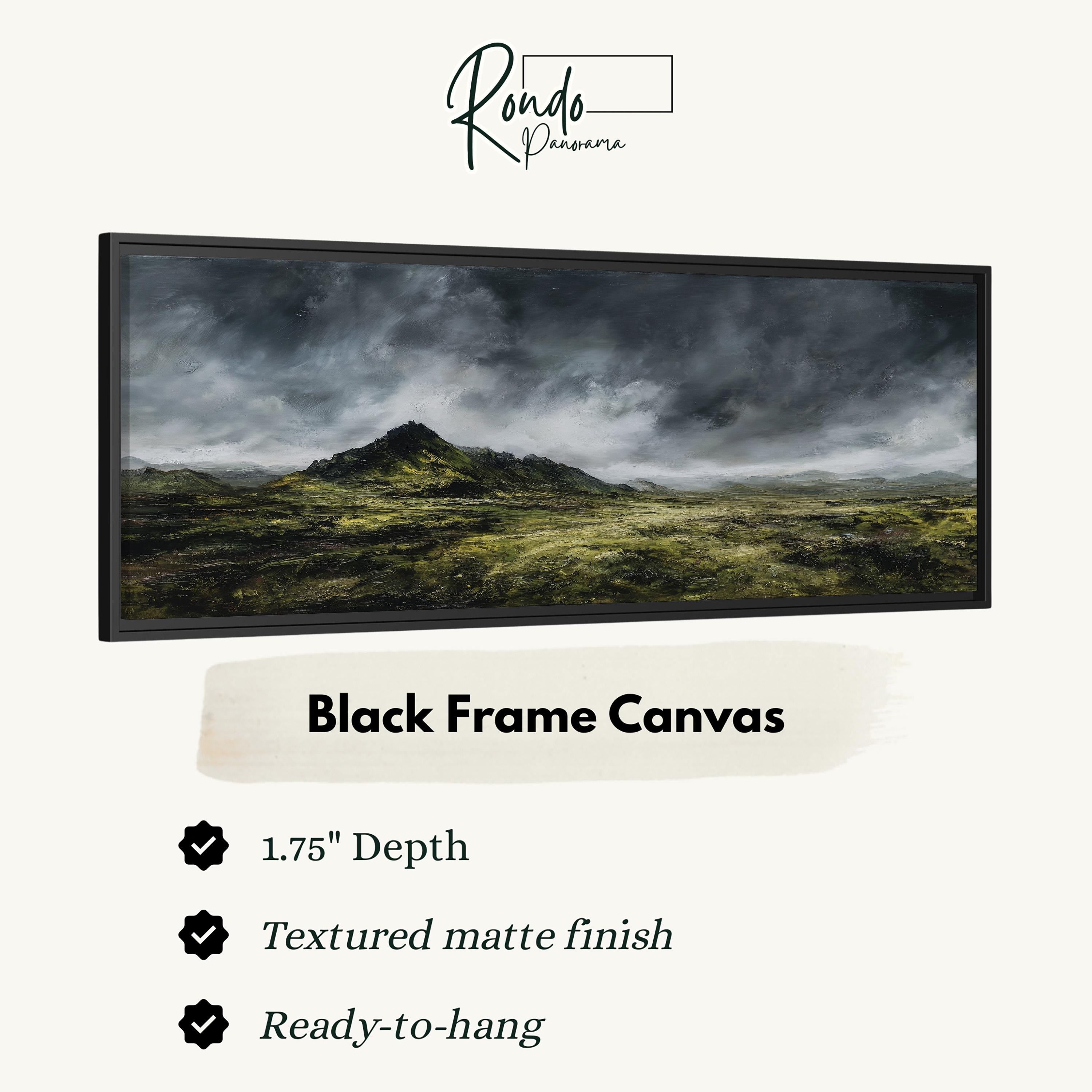 The image is a black frame canvas depicting a landscape with a mountain and a cloudy sky.