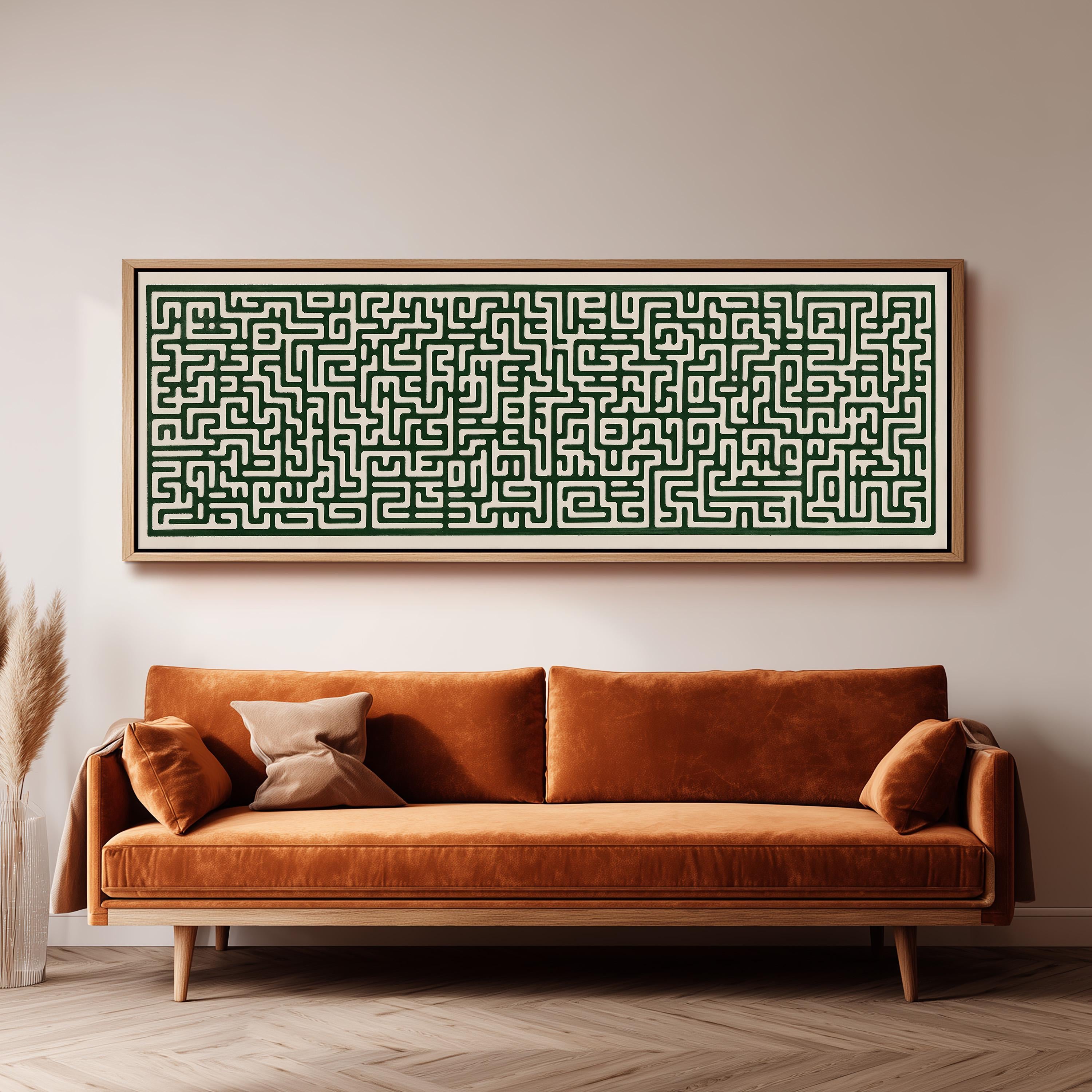 a large, ornate, and intricately designed painting of a maze hanging on a wall above a brown sofa.