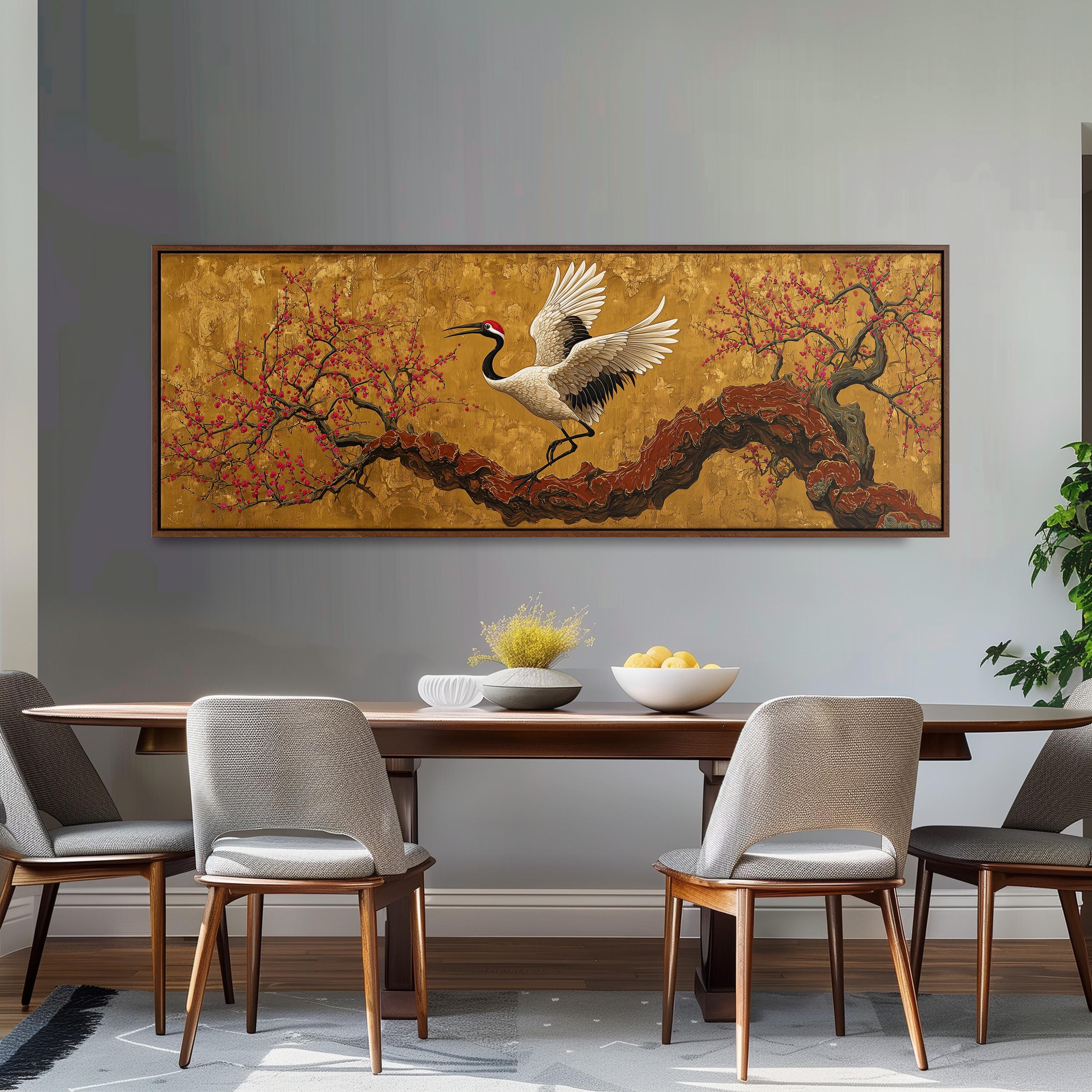 a dining room with a large painting of a crane in flight above a wooden table with four chairs. The painting is framed and hangs on the wall above the table.