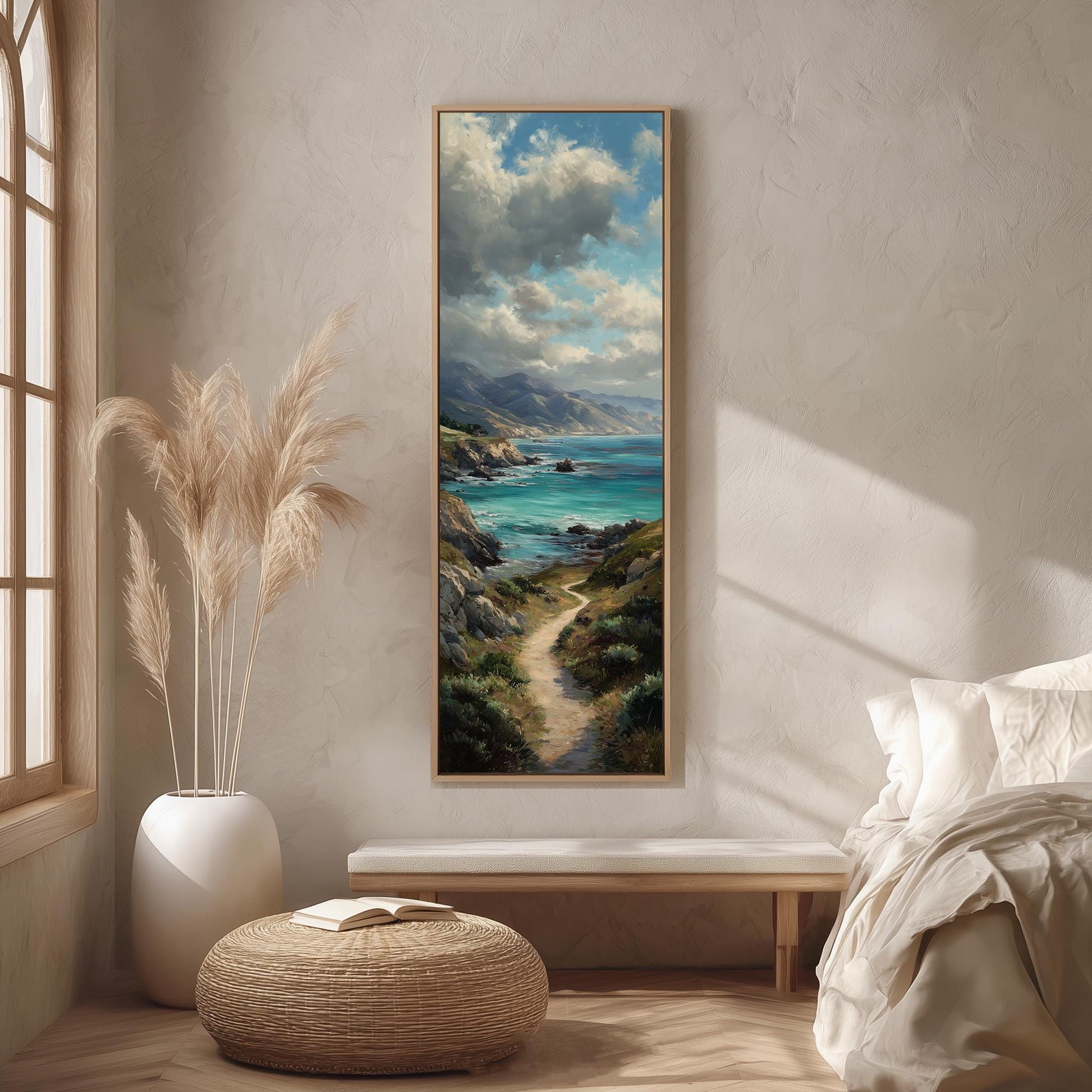 a serene bedroom scene with a large painting of a coastal landscape hanging on the wall, a white bed with a white pillow, a white vase with tall potted plants, and a woven ottoman in front of the bed.