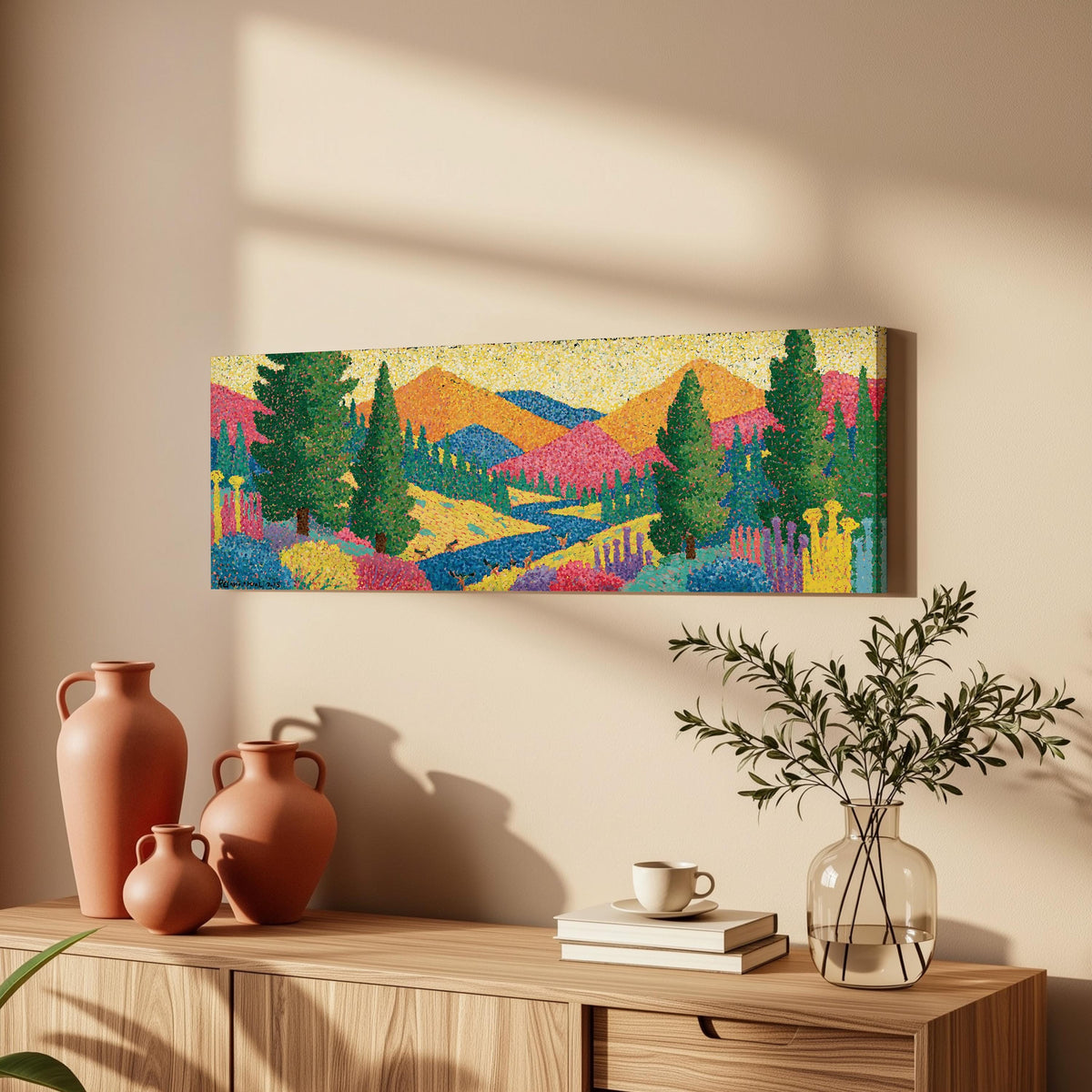 Colorful pine mountain valley long horizontal canvas print above a wooden sideboard