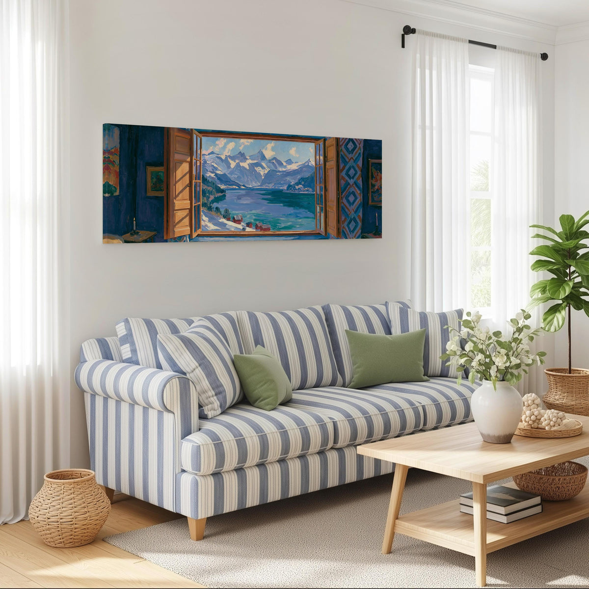 Snowy alpine lake seen through a window long horizontal canvas print above a striped sofa in a coastal living room
