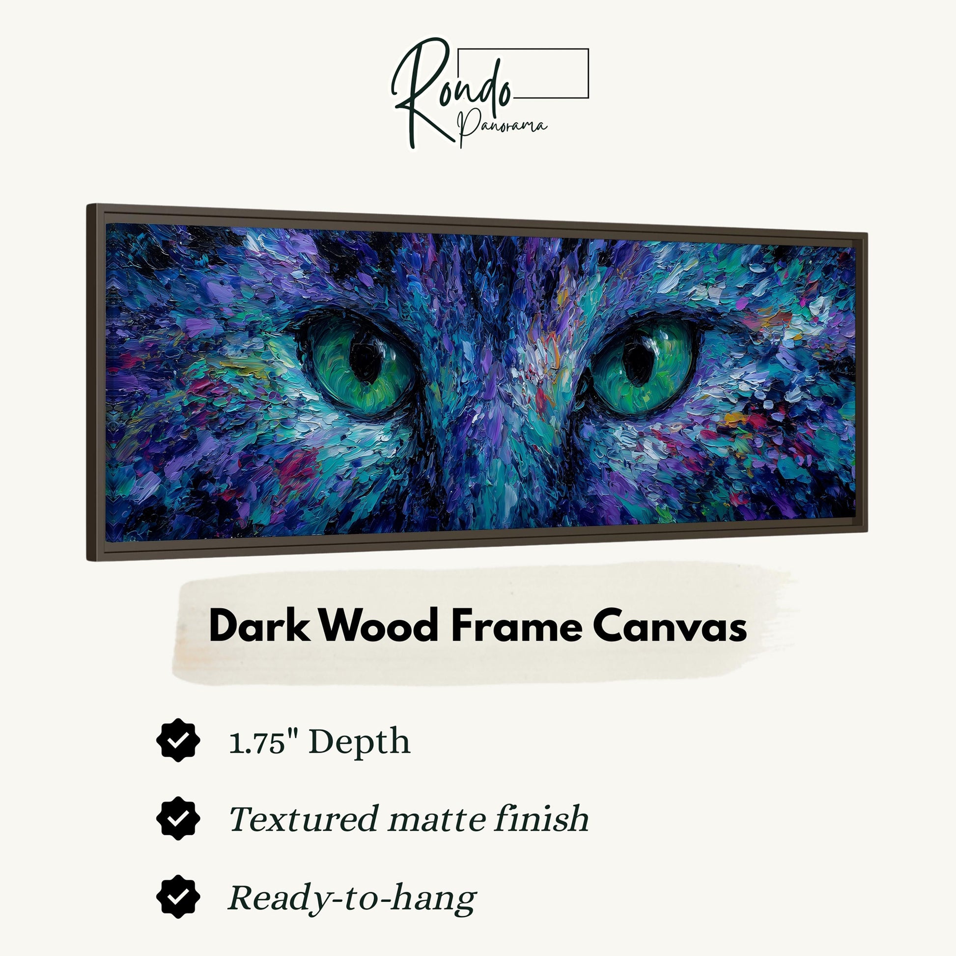 The image is a framed artwork depicting the close-up of a cat's eyes, with a dark wood frame.