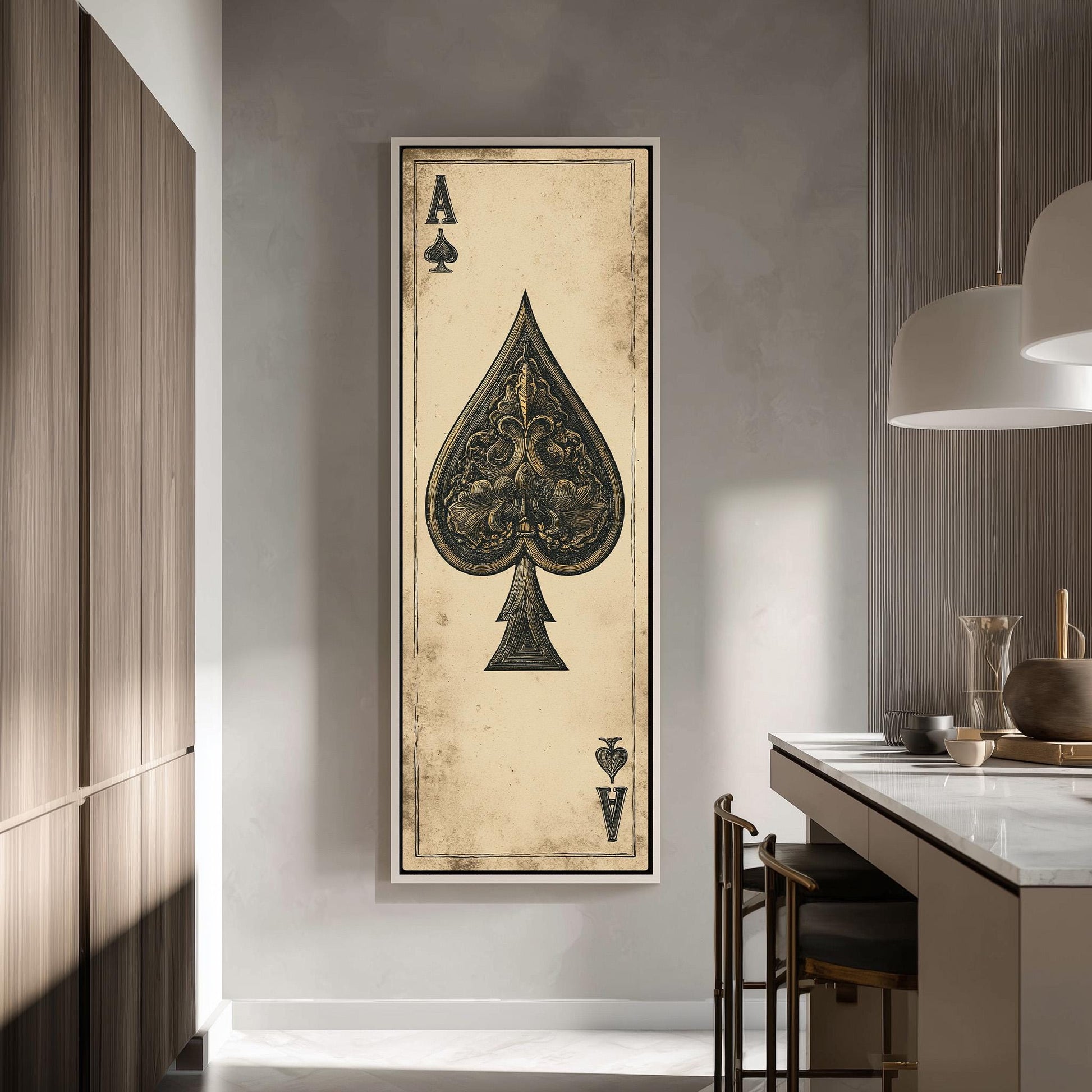 a large framed artwork of a spade playing card on the wall of a modern kitchen.