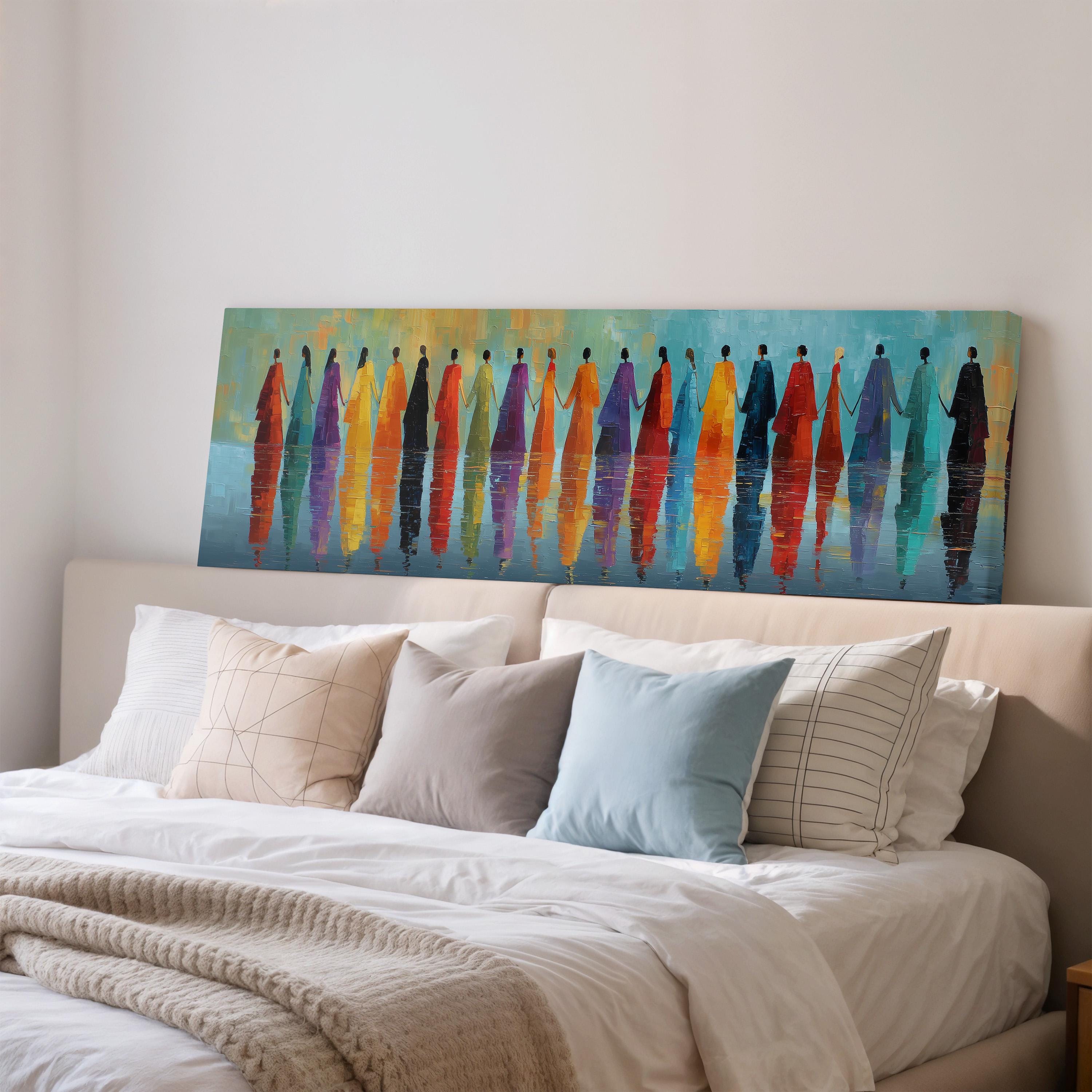 a large painting of people in colorful clothing displayed on a wall above a bed with white bedding and pillows.