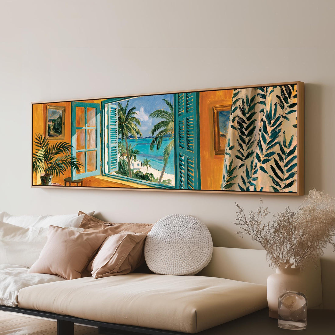 Beach house window overlooking palms and sea long horizontal canvas print above a sofa in a living room