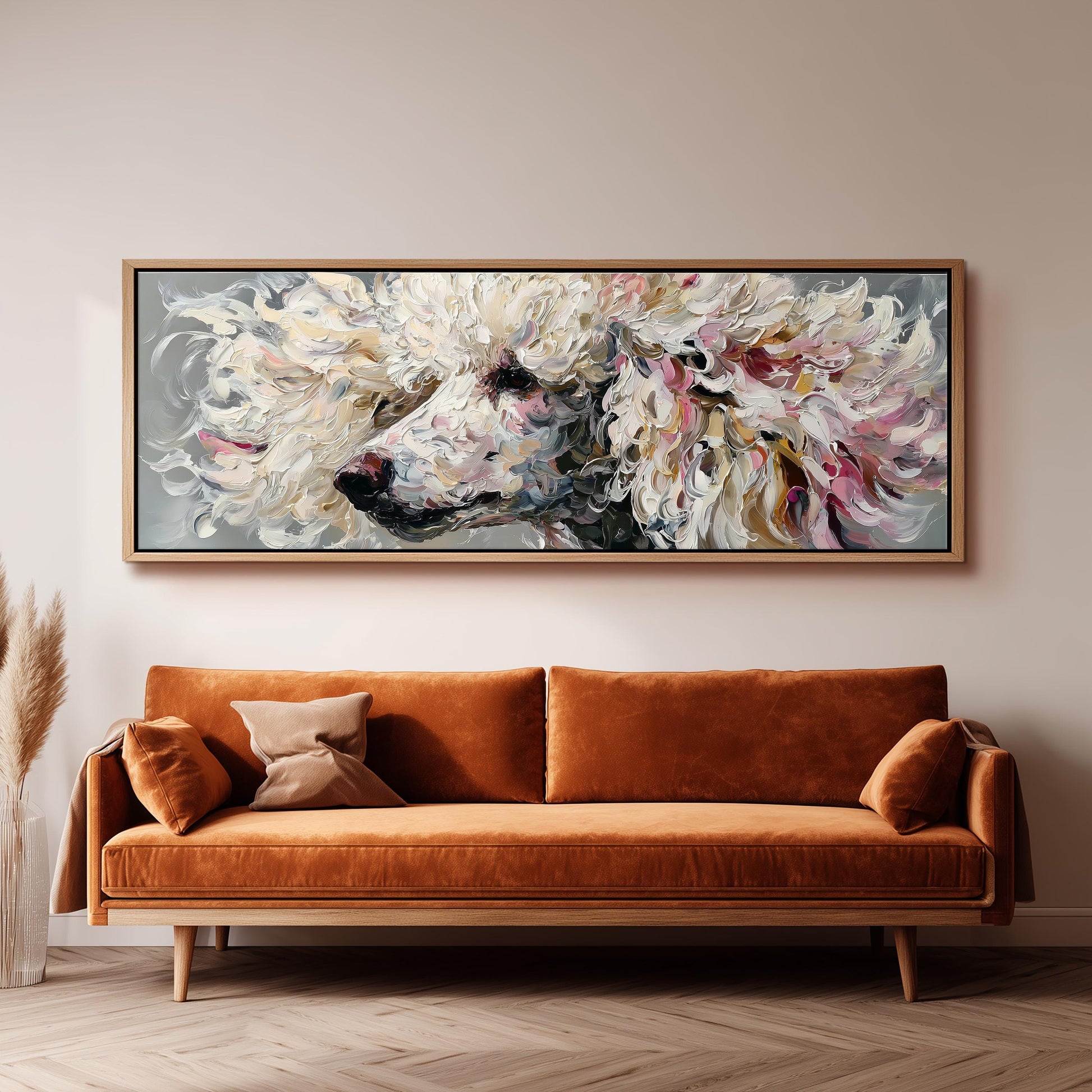 a large, vibrant painting of a poodle's face hanging on a wall above a brown sofa.