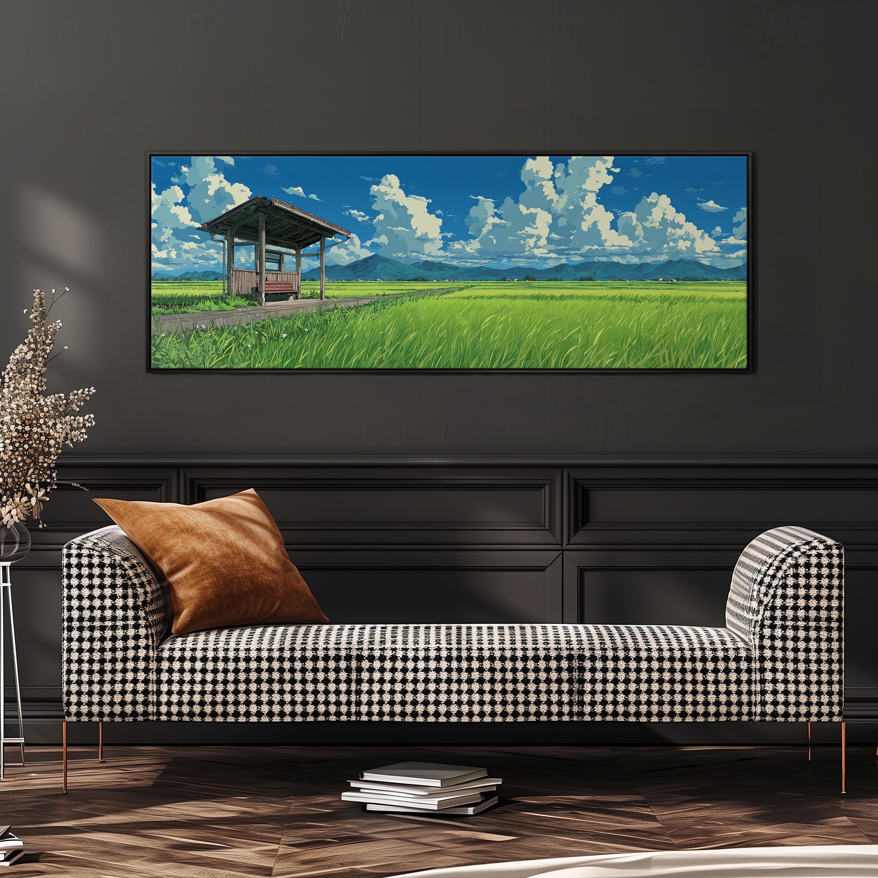 a large, rectangular painting of a rural landscape hanging on a wall above a black and white checkered sofa.