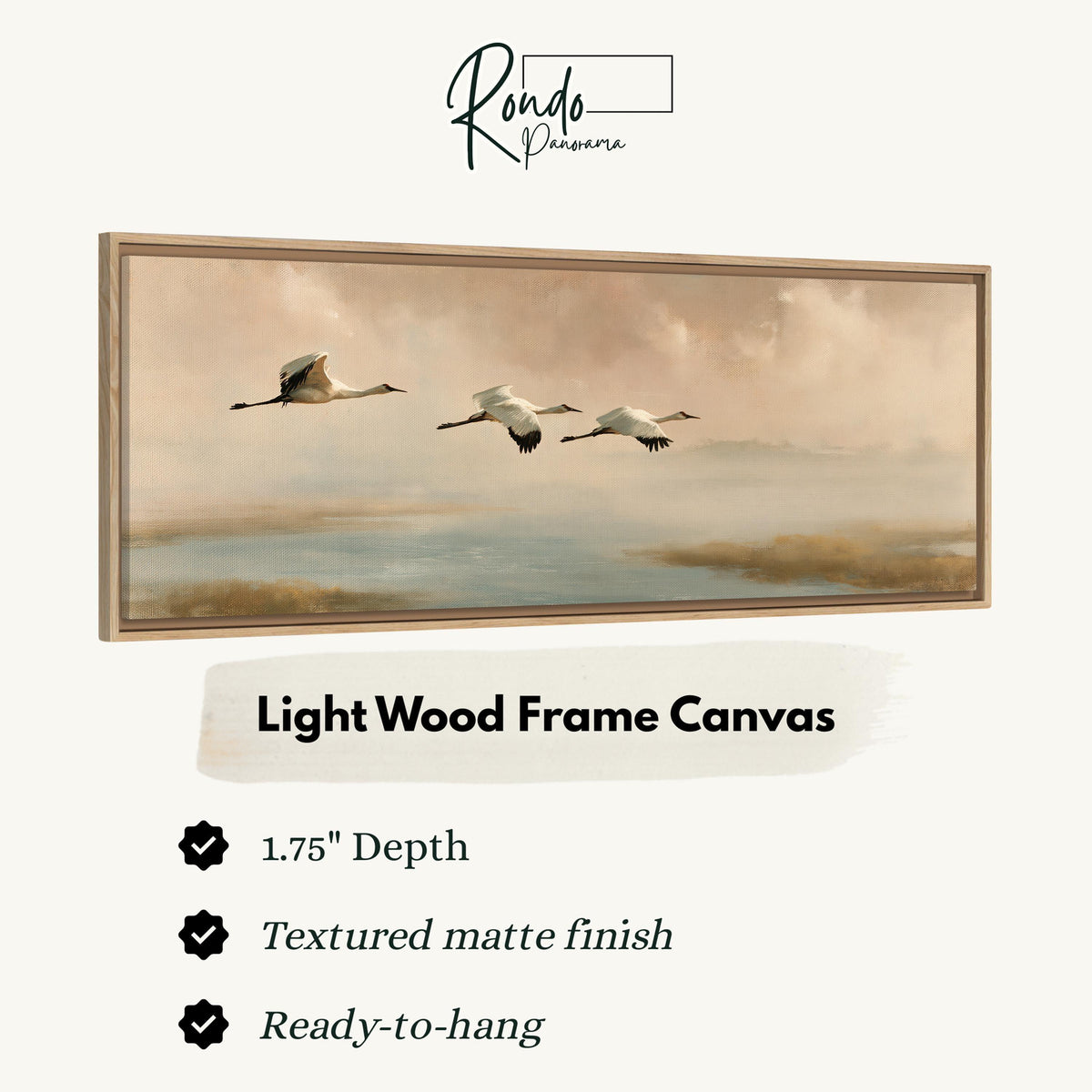Cranes flying over a calm shore at dusk canvas print in a light wood floating frame