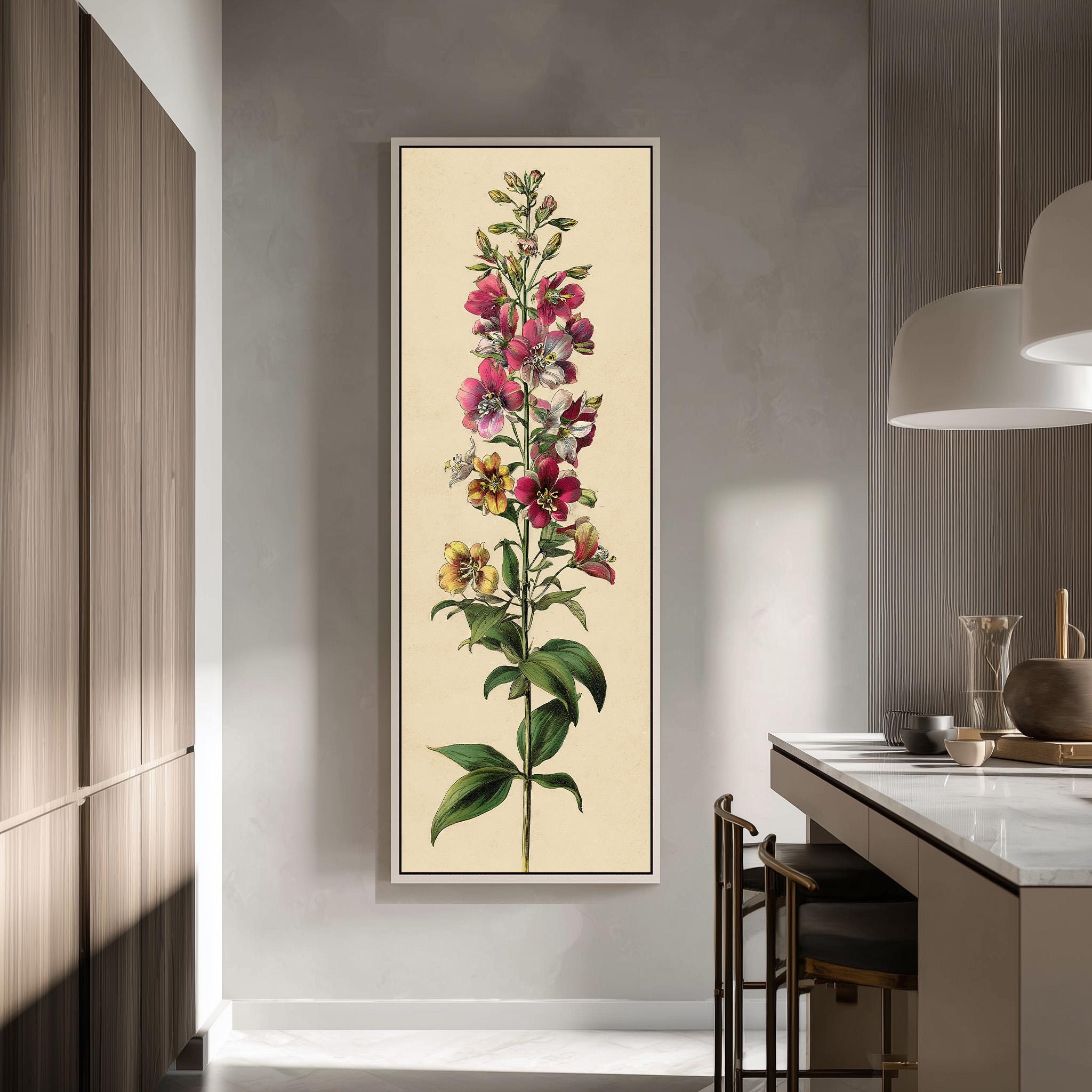 a large framed print of a tall flower with pink and yellow blooms, hanging on a wall in a modern kitchen.