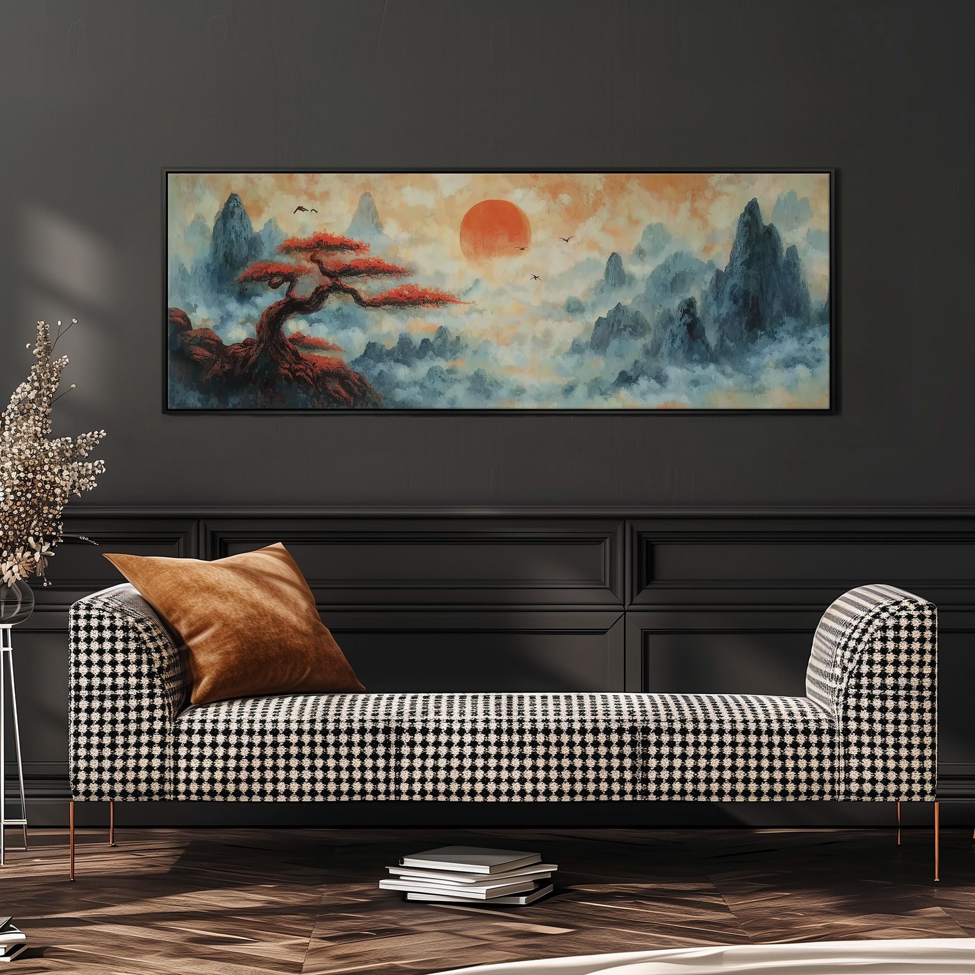 a large, colorful painting of a landscape with a tree and mountains, hanging on a wall above a black and white checkered sofa.