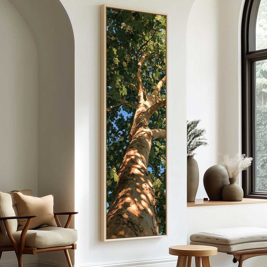 Sunlit tree trunk and summer canopy long vertical canvas print in a sunlit living space
