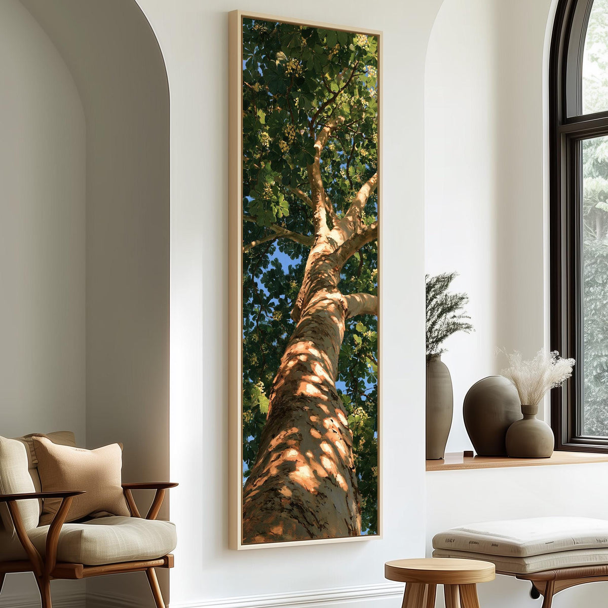 Sunlit tree trunk and summer canopy tall skinny canvas print in a sunlit living space