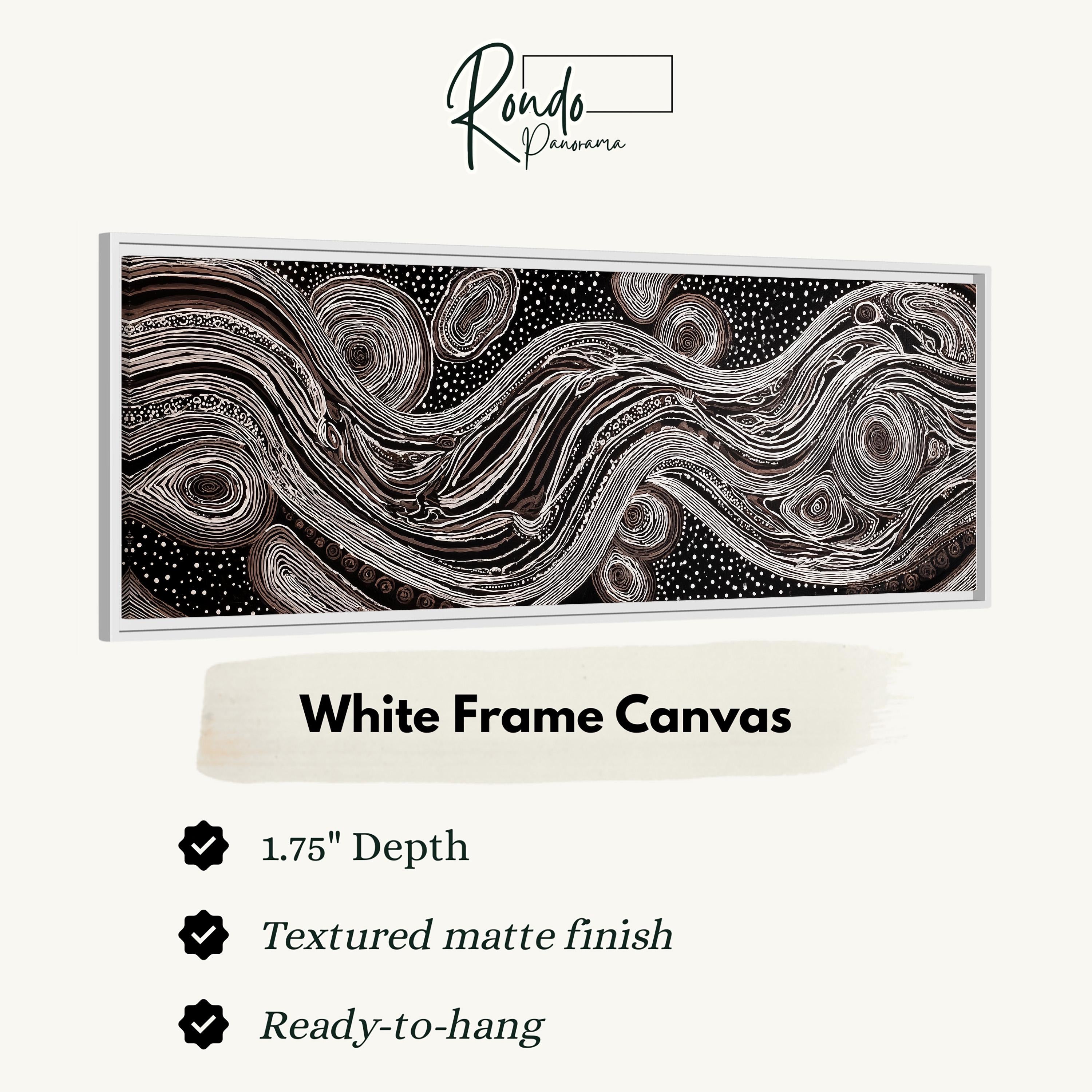 The image is a white frame canvas with a black abstract design featuring swirling lines and shapes.