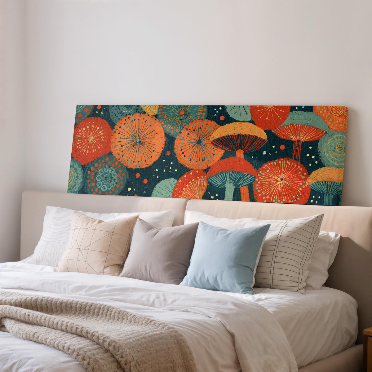 Orange and teal mushroom starburst wide panoramic canvas print above a bed in a bedroom