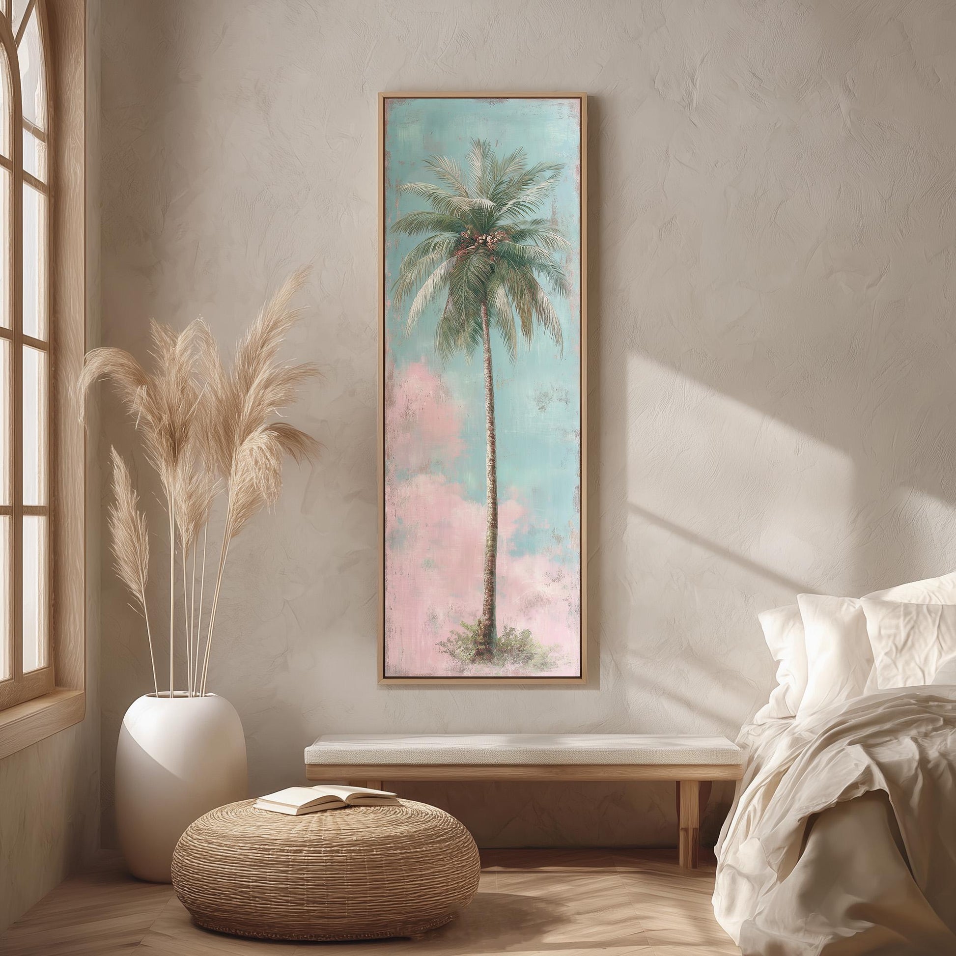 a serene bedroom scene with a large framed painting of a palm tree hanging on the wall, a white bed with a white pillow, a white vase with tall potted plants, and a woven ottoman in front of the bed.
